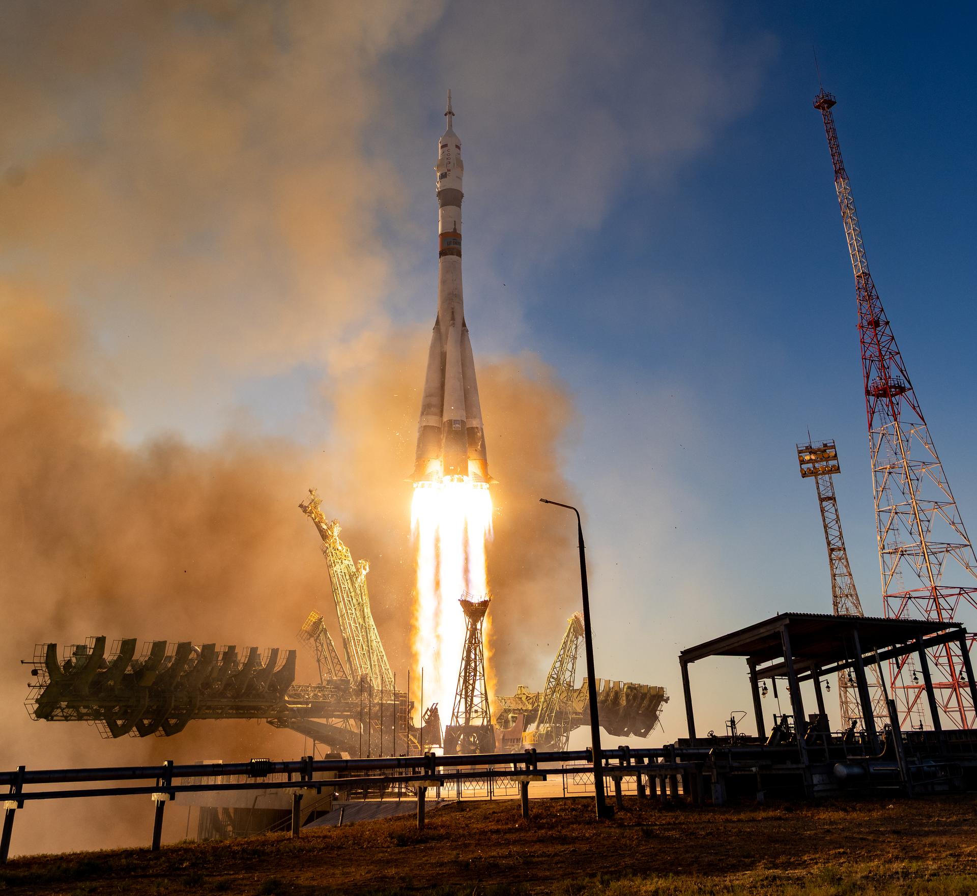 The Soyuz rocket launches to the International Space Station with Expedition 75 crewmembers: NASA astronaut Anil Menon, Roscosmos cosmonauts Pyotr Dubrov, and Anna Kikina onboard, Tuesday, July 14, 2026, at the Baikonur Cosmodrome in Kazakhstan. Photo Credit: (NASA/Bill Ingalls)