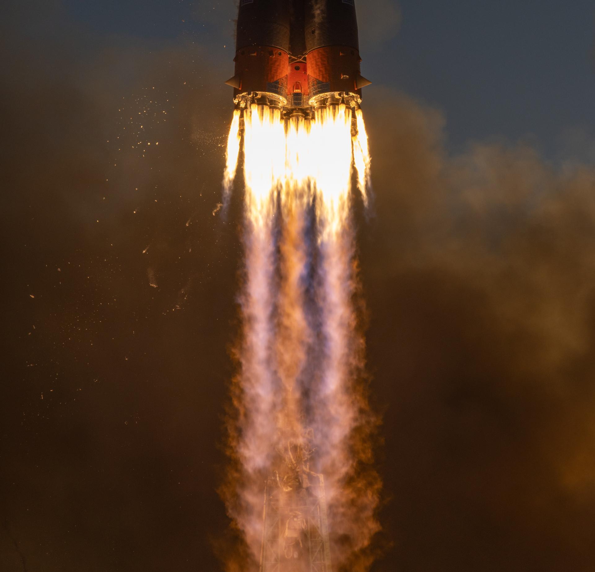 The Soyuz rocket launches to the International Space Station with Expedition 75 crewmembers: NASA astronaut Anil Menon, Roscosmos cosmonauts Pyotr Dubrov, and Anna Kikina onboard, Tuesday, July 14, 2026, at the Baikonur Cosmodrome in Kazakhstan. Photo Credit: (NASA/Bill Ingalls)