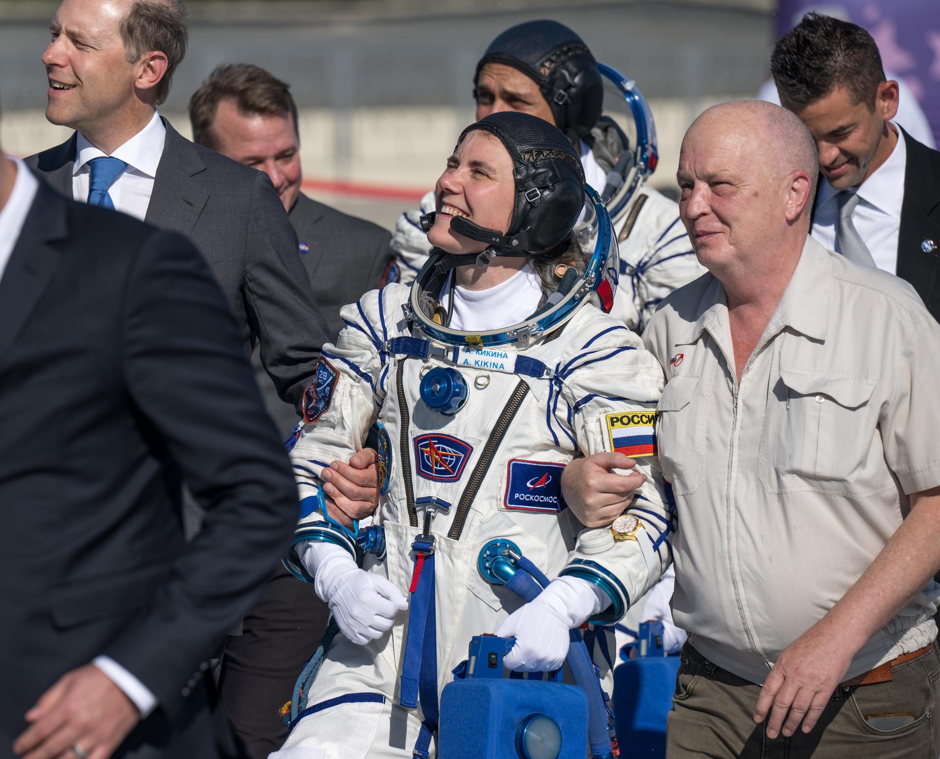 Expedition 75 Roscosmos cosmonaut Anna Kikina walks to board the Soyuz MS-29 spacecraft for launch with NASA astronaut Anil Menon, and Roscosmos cosmonaut Pyotr Dubrov, Tuesday, July 14, 2026 at the Baikonur Cosmodrome in Kazakhstan. Launch of the Soyuz rocket will send the trio on a mission to the International Space Station. Photo Credit: (NASA/Bill Ingalls)