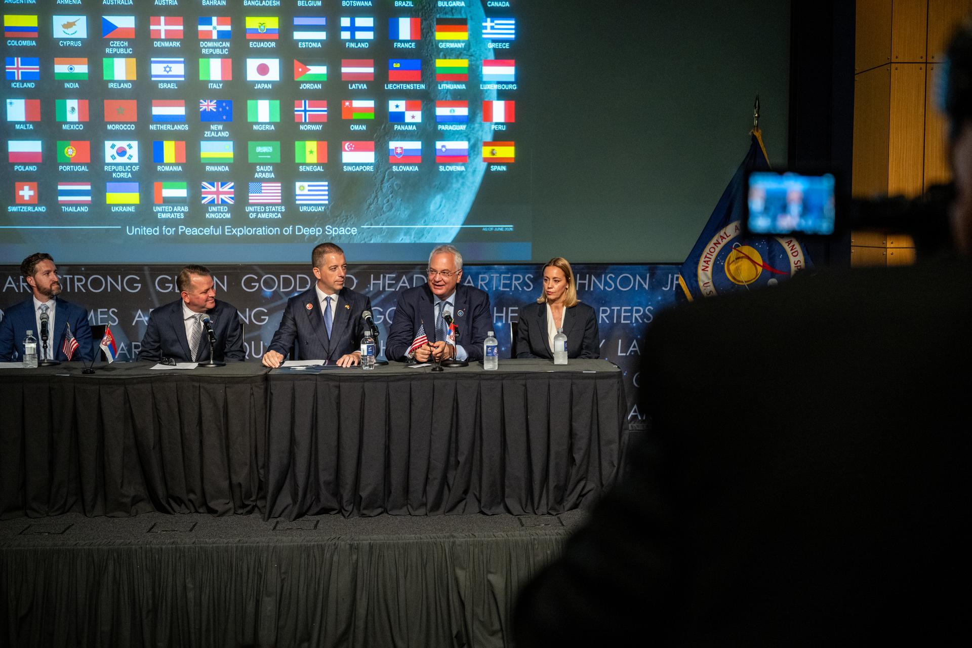 Ambassador of Serbia to the Unites States Dragan Šutanovac, second from right, delivers remarks during an Artemis Accords signing ceremony Thursday, July 16, 2026, at the Mary W. Jackson NASA Headquarters building in Washington. Serbia is the 69th country to sign the Artemis Accords, which establish a practical set of principles to guide space exploration cooperation among nations participating in NASA’s Artemis program. Photo Credit: (NASA/Keegan Barber)