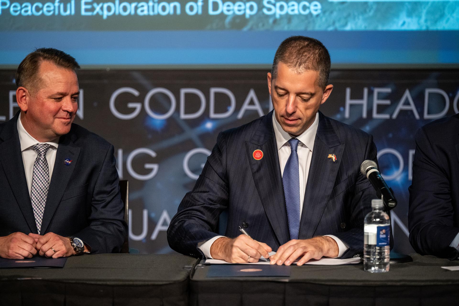 Minister of Foreign Affairs for Serbia Marko Đurić, right, joined by NASA Deputy Administrator Matt Anderson, left, signs the Artemis Accords Thursday, July 16, 2026, at the Mary W. Jackson NASA Headquarters building in Washington. Serbia is the 69th country to sign the Artemis Accords, which establish a practical set of principles to guide space exploration cooperation among nations participating in NASA’s Artemis program. Photo Credit: (NASA/Keegan Barber)
