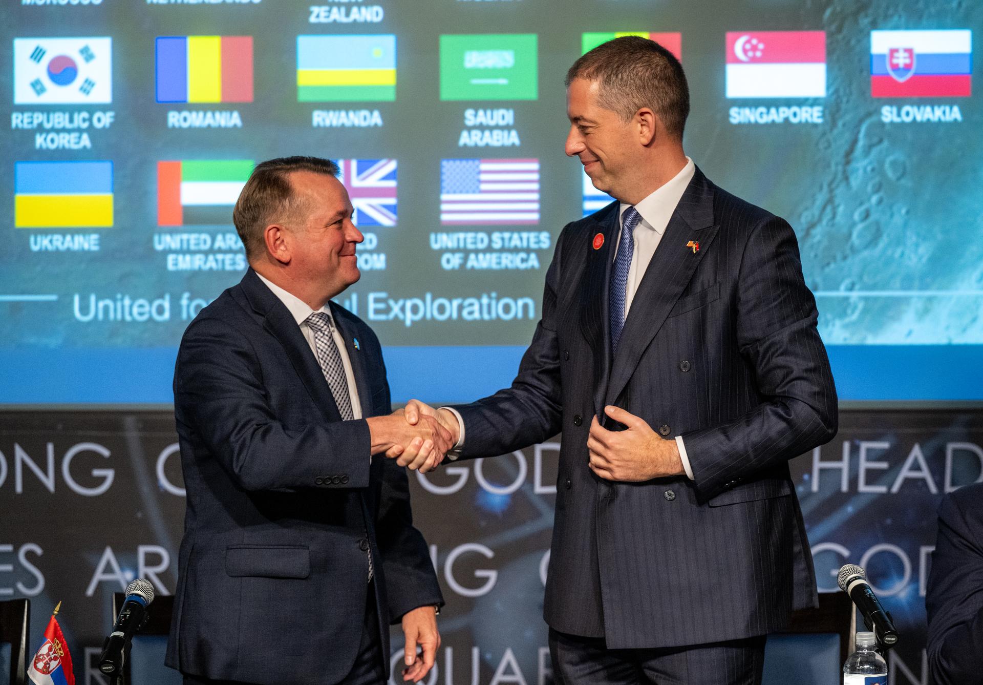 Minister of Foreign Affairs for Serbia Marko Đurić, right, shakes hands with NASA Deputy Administrator Matt Anderson, left, after signing the Artemis Accords Thursday, July 16, 2026, at the Mary W. Jackson NASA Headquarters building in Washington. Serbia is the 69th country to sign the Artemis Accords, which establish a practical set of principles to guide space exploration cooperation among nations participating in NASA’s Artemis program. Photo Credit: (NASA/Keegan Barber)