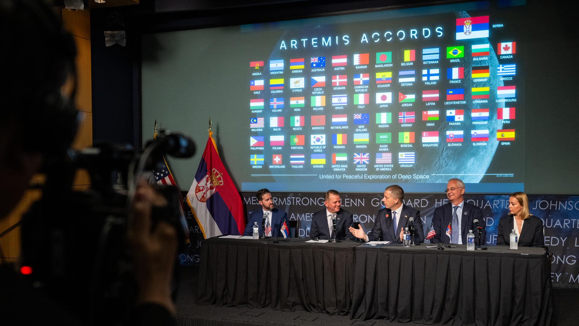 Minister of Foreign Affairs Marko Đurić, third from right, delivers remarks alongside, seated from left to right, Assistant Secretary of State for Oceans and International Environmental and Scientific Affairs Wesley Brooks, NASA Deputy Administrator Matt Anderson, Ambassador of Serbia to the Unites States Dragan Šutanovac, and State Secretary at the Ministry of Science, Technological Development & Innovation Marija Gnjatović, during an Artemis Accords signing ceremony Thursday, July 16, 2026, at the Mary W. Jackson NASA Headquarters building in Washington. Serbia is the 69th country to sign the Artemis Accords, which establish a practical set of principles to guide space exploration cooperation among nations participating in NASA’s Artemis program. Photo Credit: (NASA/Keegan Barber)