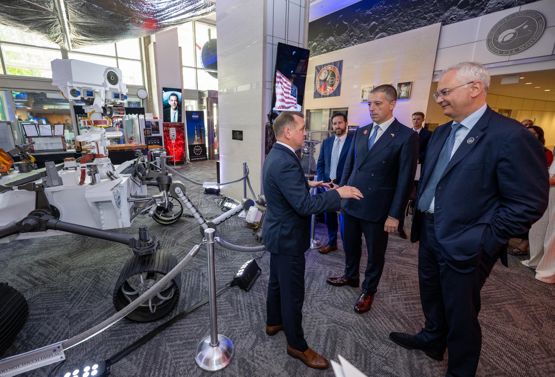 NASA Deputy Administrator Matt Anderson, left, greets, from left to right, Assistant Secretary of State for Oceans and International Environmental and Scientific Affairs Wesley Brooks, Minister of Foreign Affairs Marko Đurić, and Ambassador of Serbia to the Unites States Dragan Šutanovac prior to an Artemis Accords signing ceremony Thursday, July 16, 2026, at the Mary W. Jackson NASA Headquarters building in Washington. Serbia is the 69th country to sign the Artemis Accords, which establish a practical set of principles to guide space exploration cooperation among nations participating in NASA’s Artemis program. Photo Credit: (NASA/Keegan Barber)