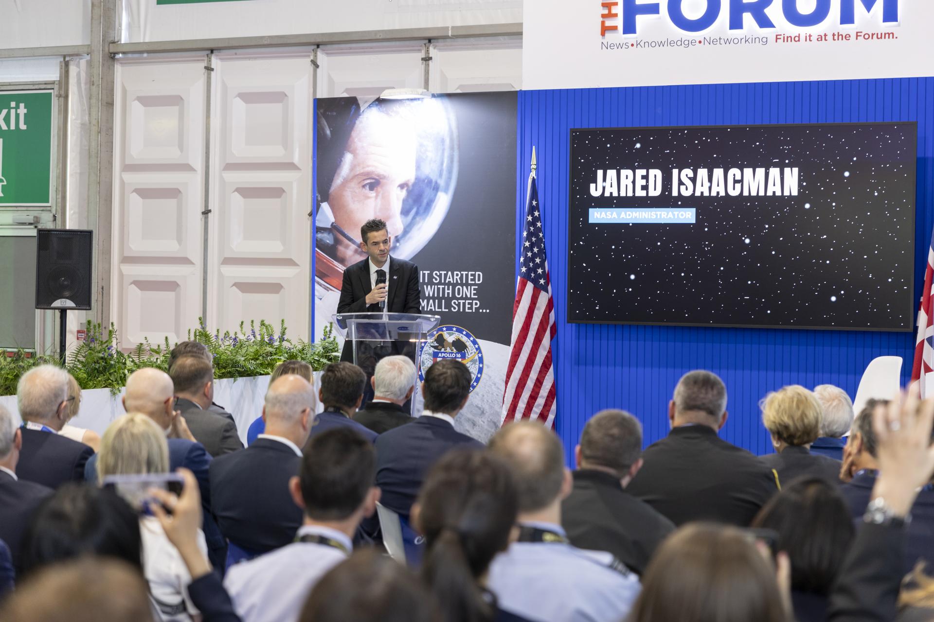 Jared Isaacman introduces Charlie Duke at the U.S. Pavillion at the Farnborough International Airshow in Farnborough, UK.
