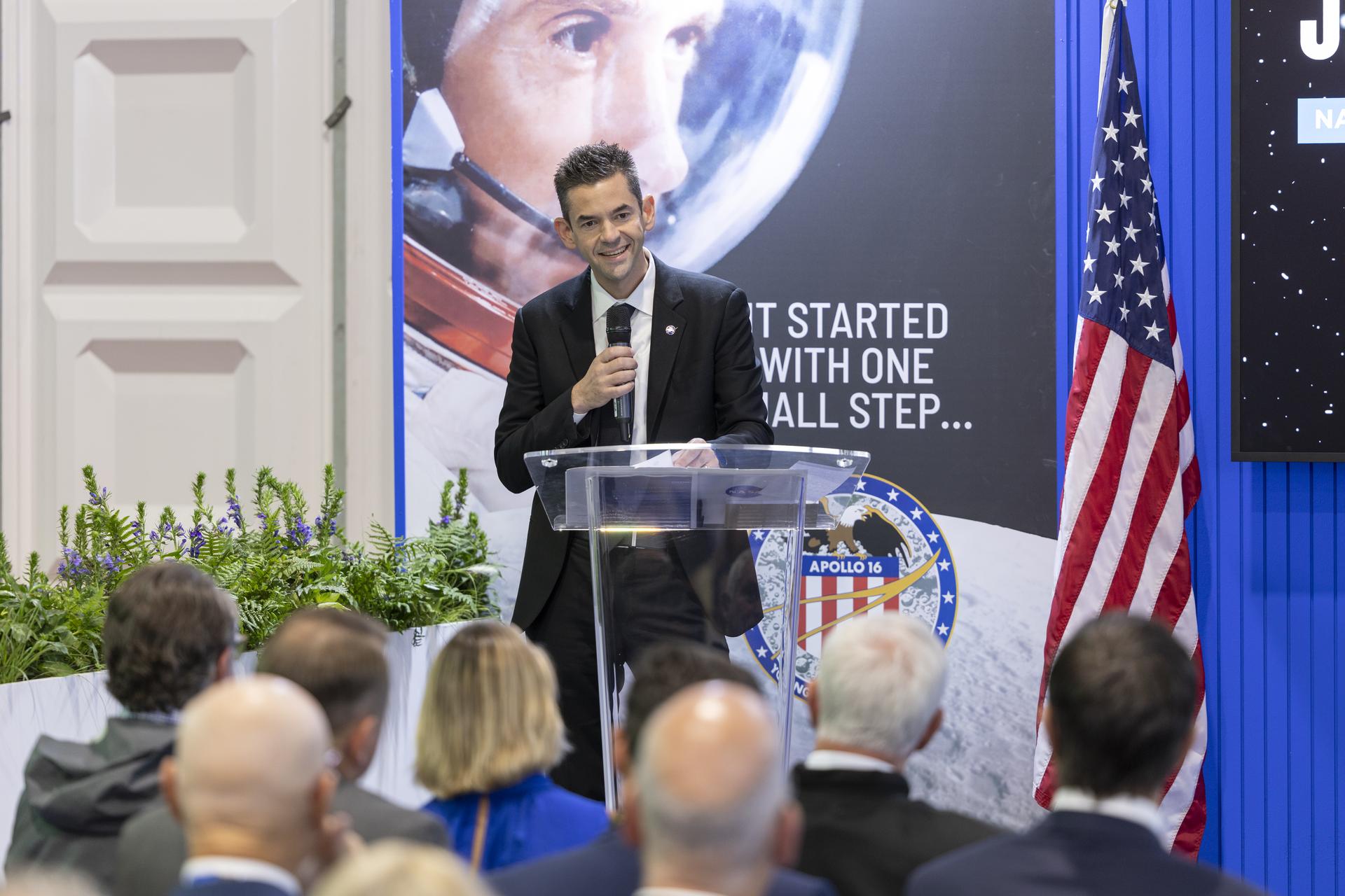 Jared Isaacman introduces Charlie Duke at the U.S. Pavillion at the Farnborough International Airshow in Farnborough, UK.