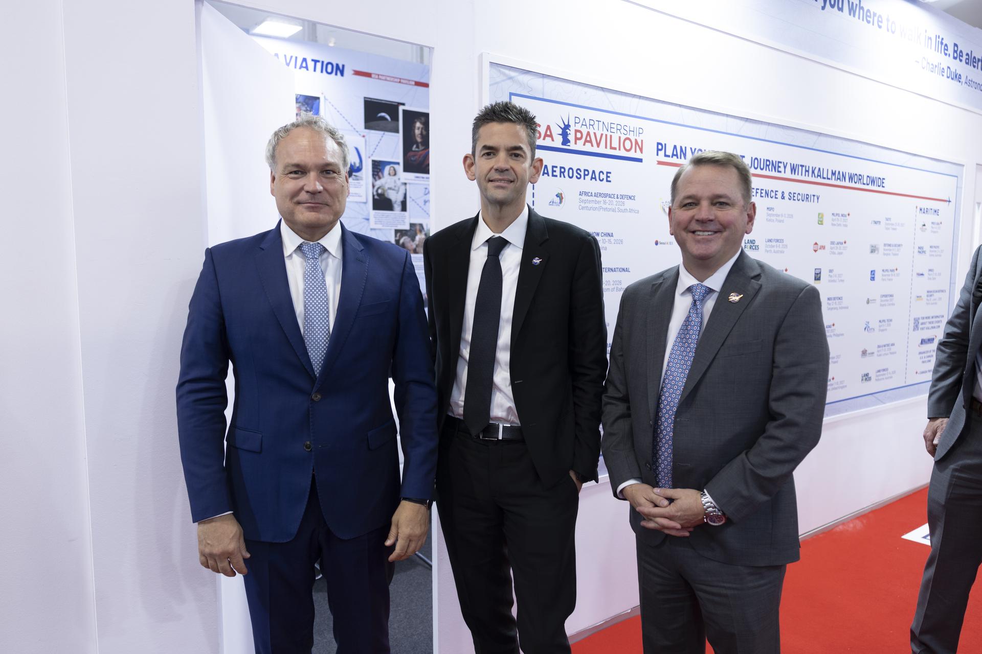 Jared Isaacman at Farnborough International Airshow in the United Kingdom with DLR Walther Pelz­er and Deputy Administrator Matt Anderson