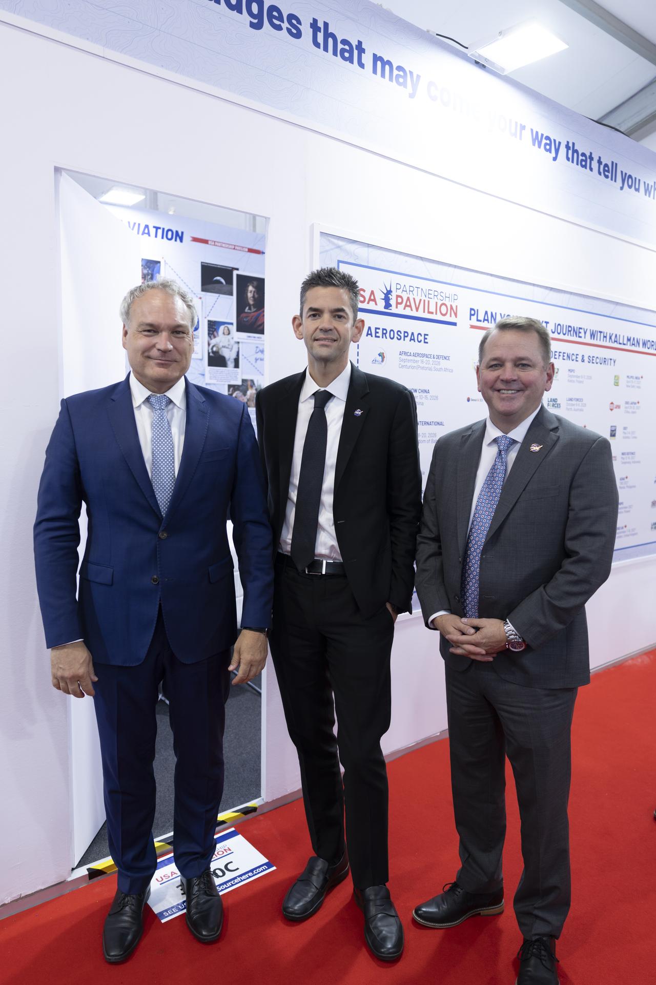 Jared Isaacman at Farnborough International Airshow in the United Kingdom with DLR Walther Pelz­er and Deputy Administrator Matt Anderson