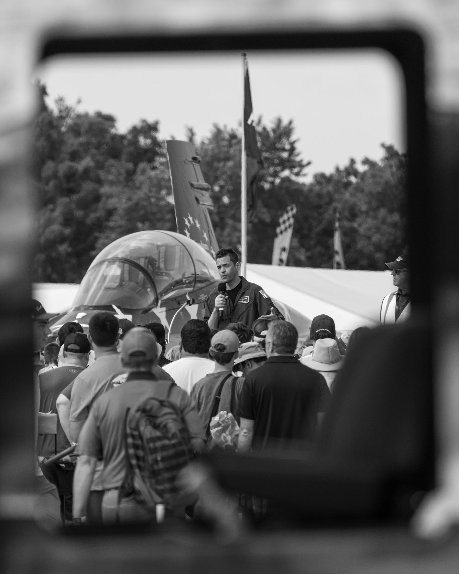NASA Administrator Jared Isaacman speaks to a crowd of air show attendees, Friday, July 24, 2026, at EAA AirVenture Oshkosh at Wittman Regional Airport in Oshkosh, Wis. Photo Credit: (NASA/John Kraus)