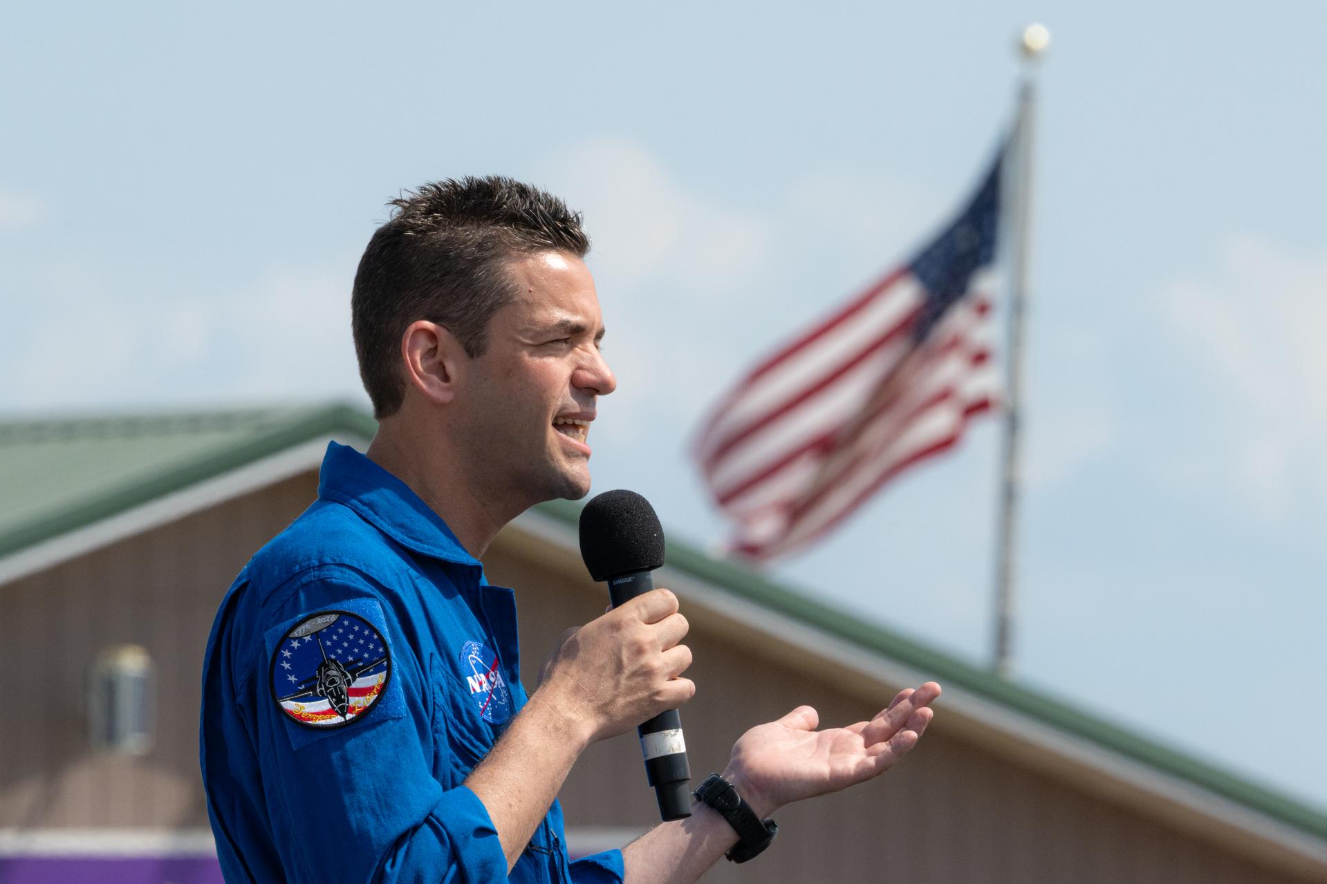 NASA Administrator Jared Isaacman speaks to a crowd of air show attendees, Friday, July 24, 2026, at EAA AirVenture Oshkosh at Wittman Regional Airport in Oshkosh, Wis. Photo Credit: (NASA/John Kraus)