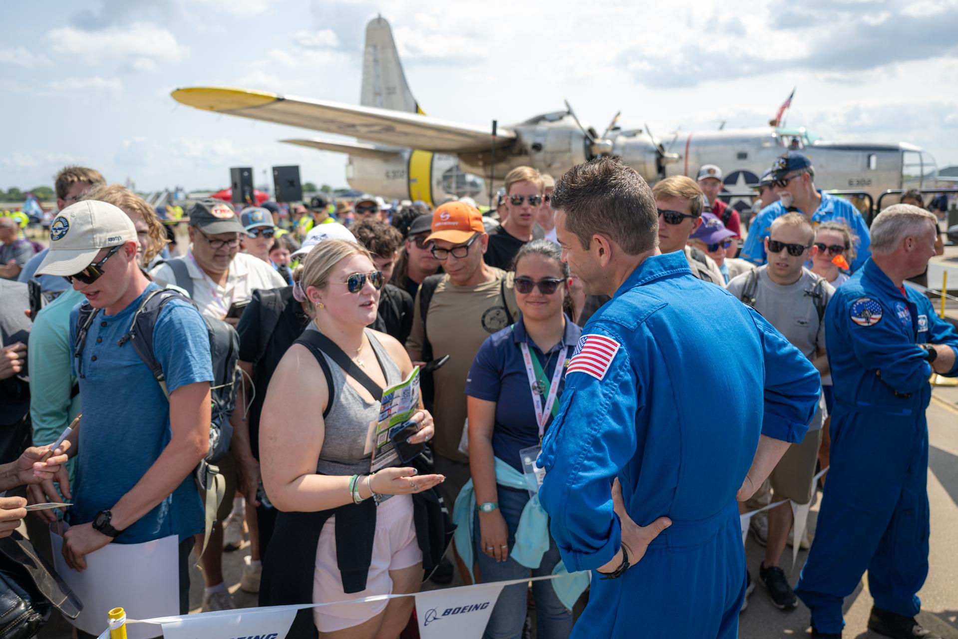 NASA Administrator Jared Isaacman greets air show attendees following a speaking arrangement, Friday, July 24, 2026, at EAA AirVenture Oshkosh at Wittman Regional Airport in Oshkosh, Wis. Photo Credit: (NASA/John Kraus)