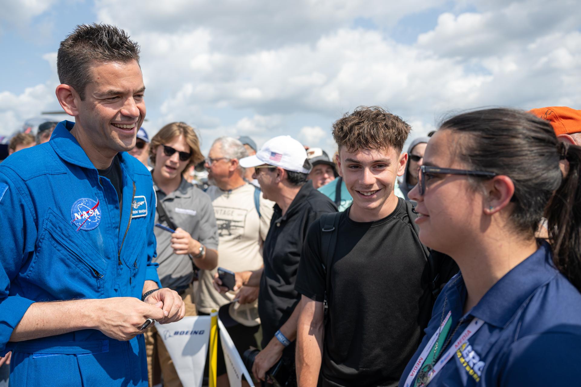 NASA Administrator Jared Isaacman greets air show attendees following a speaking arrangement, Friday, July 24, 2026, at EAA AirVenture Oshkosh at Wittman Regional Airport in Oshkosh, Wis. Photo Credit: (NASA/John Kraus)