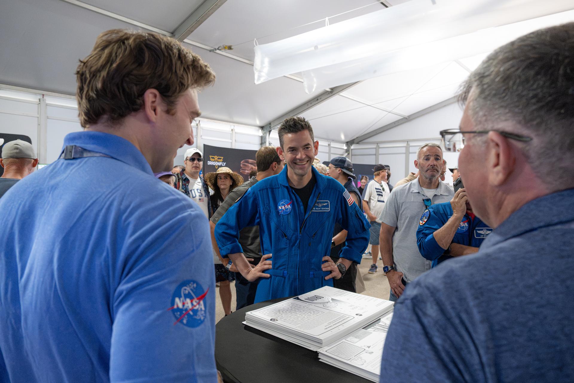 NASA Administrator Jared Isaacman speaks with members of the NASA workforce, Friday, July 24, 2026, at NASA's exhibit at EAA AirVenture Oshkosh at Wittman Regional Airport in Oshkosh, Wis. Photo Credit: (NASA/John Kraus)