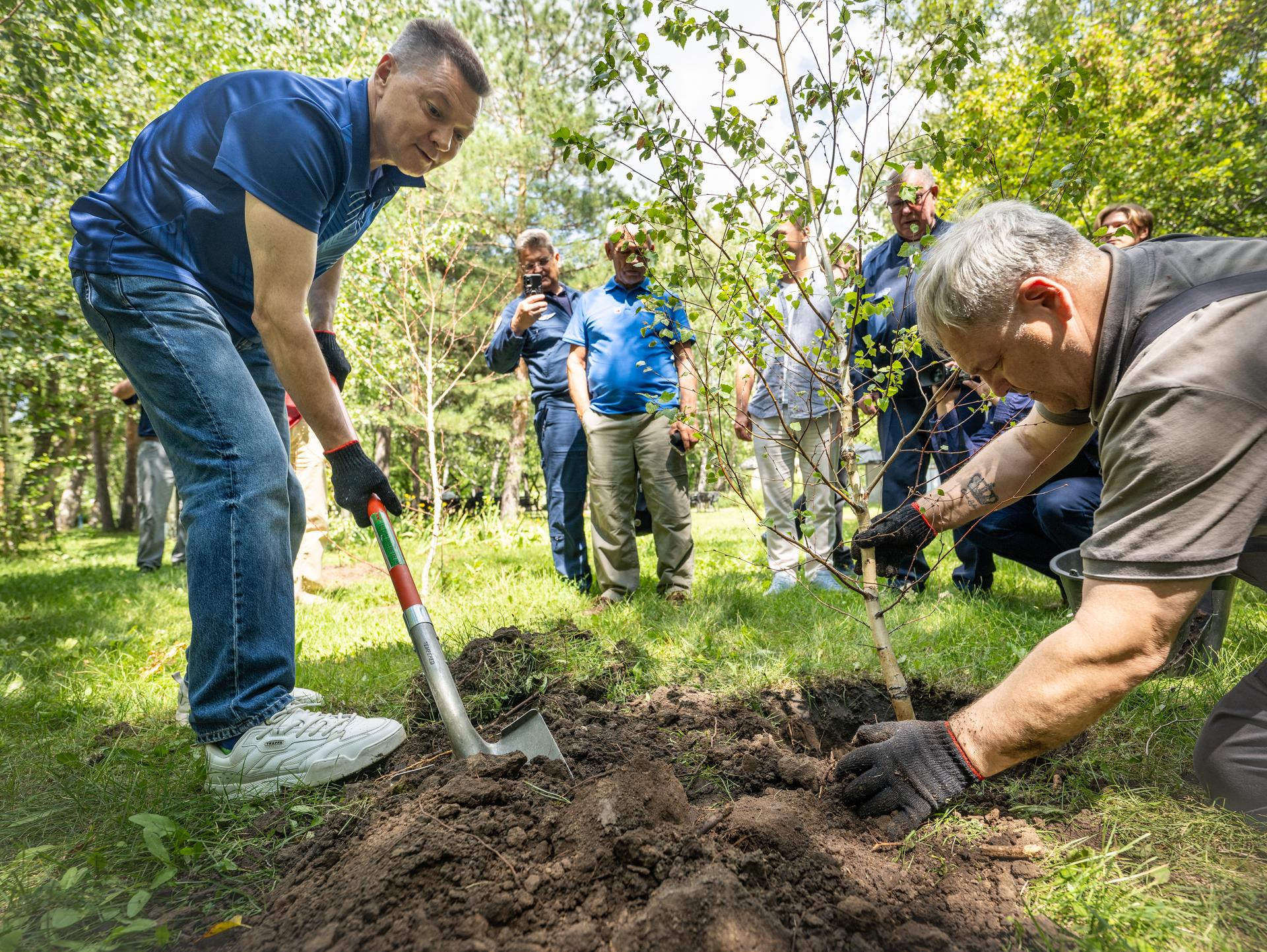 Head of Gargarin Cosmonaut Training Center Oleg Kononenko plants a tree during a traditional ceremony at the Cosmonaut Hotel in Karaganda, Kazakhstan, Saturday, July 25. Kononenko is in Karaganda to help support the Expedition 74 crew Soyuz landing from the International Space Station. Photo Credit: (NASA/Bill Ingalls)