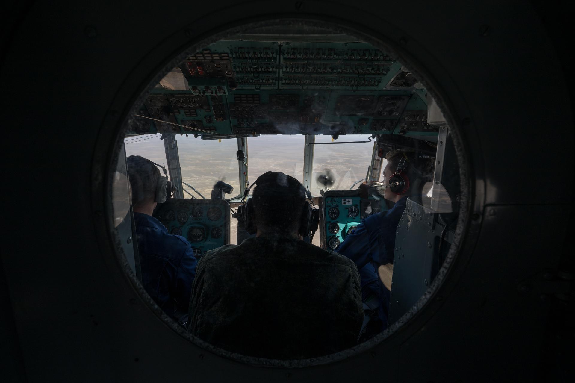Russian Search and Recovery Forces fly their MI-8 Helicopter to the predicted landing site of Expedition 74 NASA astronaut Chris Williams, and Roscosmos cosmonauts Sergey Kud-Sverchkov, and Sergei Mikaev, Sunday, July 26, 2026 outside of Zhezkazgan, Kazakhstan. Williams, Kud-Sverchkov, and Mikaev, are returning to Earth after logging 241 days in space as a members of Expeditions 73 and 74 aboard the International Space Station. Photo Credit: (NASA/Bill Ingalls)