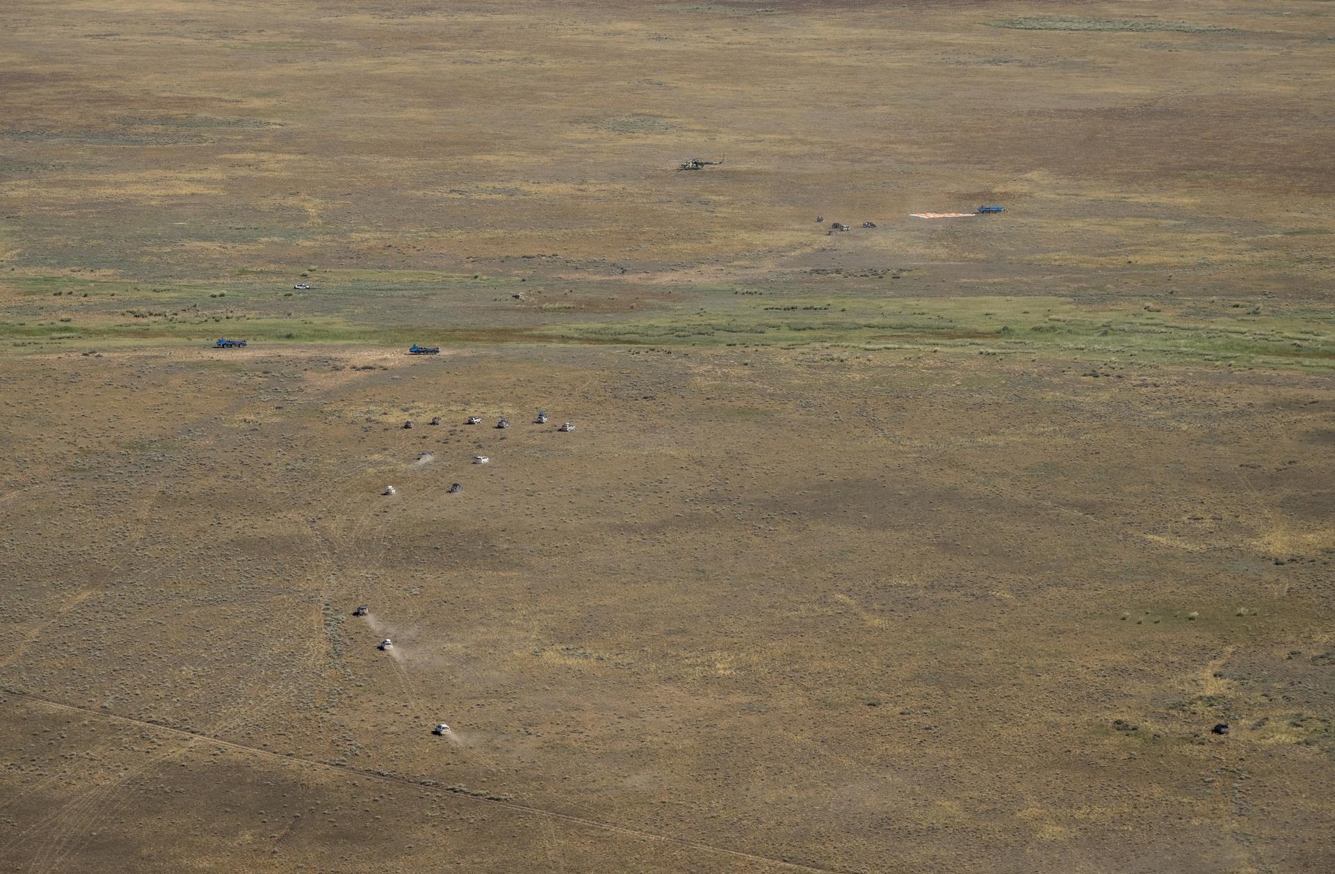 The Soyuz MS-28 spacecraft is seen after it landed in a remote area near the town of Zhezkazgan, Kazakhstan with Expedition 74 NASA astronaut Chris Williams, and Roscosmos cosmonauts Sergey Kud-Sverchkov, and Sergei Mikaev aboard, Sunday, July 26, 2026. The trio are returning to Earth after logging 241 days in space as members of Expeditions 73 and 74 aboard the International Space Station. Photo Credit: (NASA/Bill Ingalls)