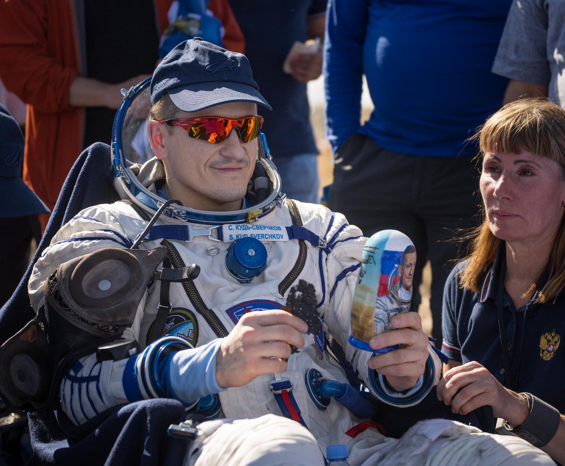 Roscosmos cosmonaut Sergey Kud-Sverchkov is seen outside the Soyuz MS-28 spacecraft after he landed with Expedition 74 NASA astronaut Chris Williams, and Roscosmos cosmonaut Sergei Mikaev in a remote area near the town of Zhezkazgan, Kazakhstan on Sunday, July 26, 2026. The trio returned to Earth after logging 241 days in space as a members of Expeditions 73 and 74 aboard the International Space Station. Photo Credit: (NASA/Bill Ingalls)