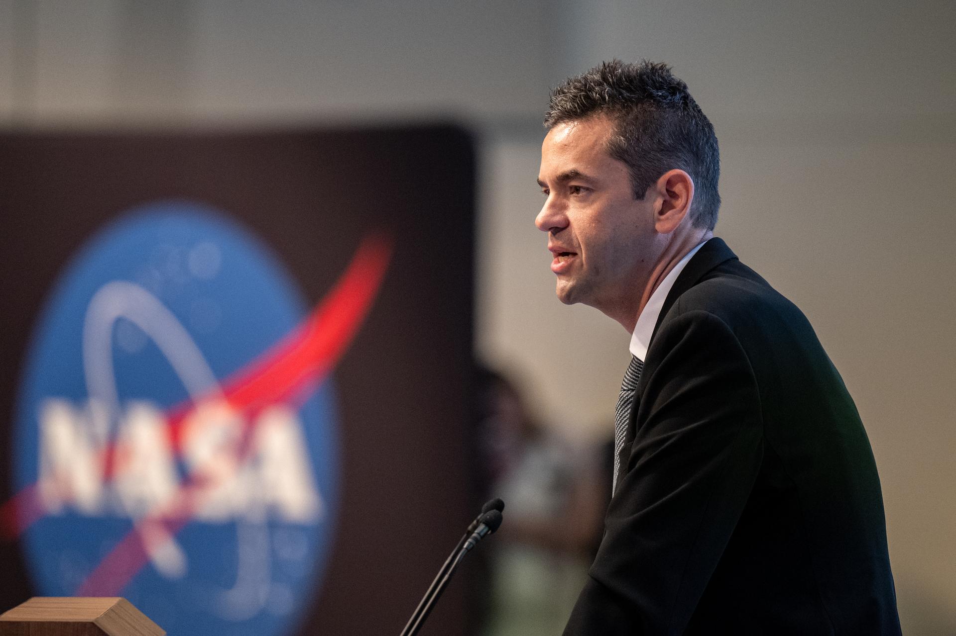 NASA Administrator Jared Isaacman delivers remarks during a ribbon cutting ceremony for the Flight Dynamics Research Facility, NASA's newest wind tunnel,  Friday, July 31, 2026, at NASA’s Langley Research Center in Hampton, Virginia. The state-of-the-art facility will support research and technology development that will advance the agency’s aeronautics, exploration, and science goals, including establishing a sustained human presence on the lunar surface through the Artemis program and the development of a Moon Base. Photo Credit: (NASA/Keegan Barber)