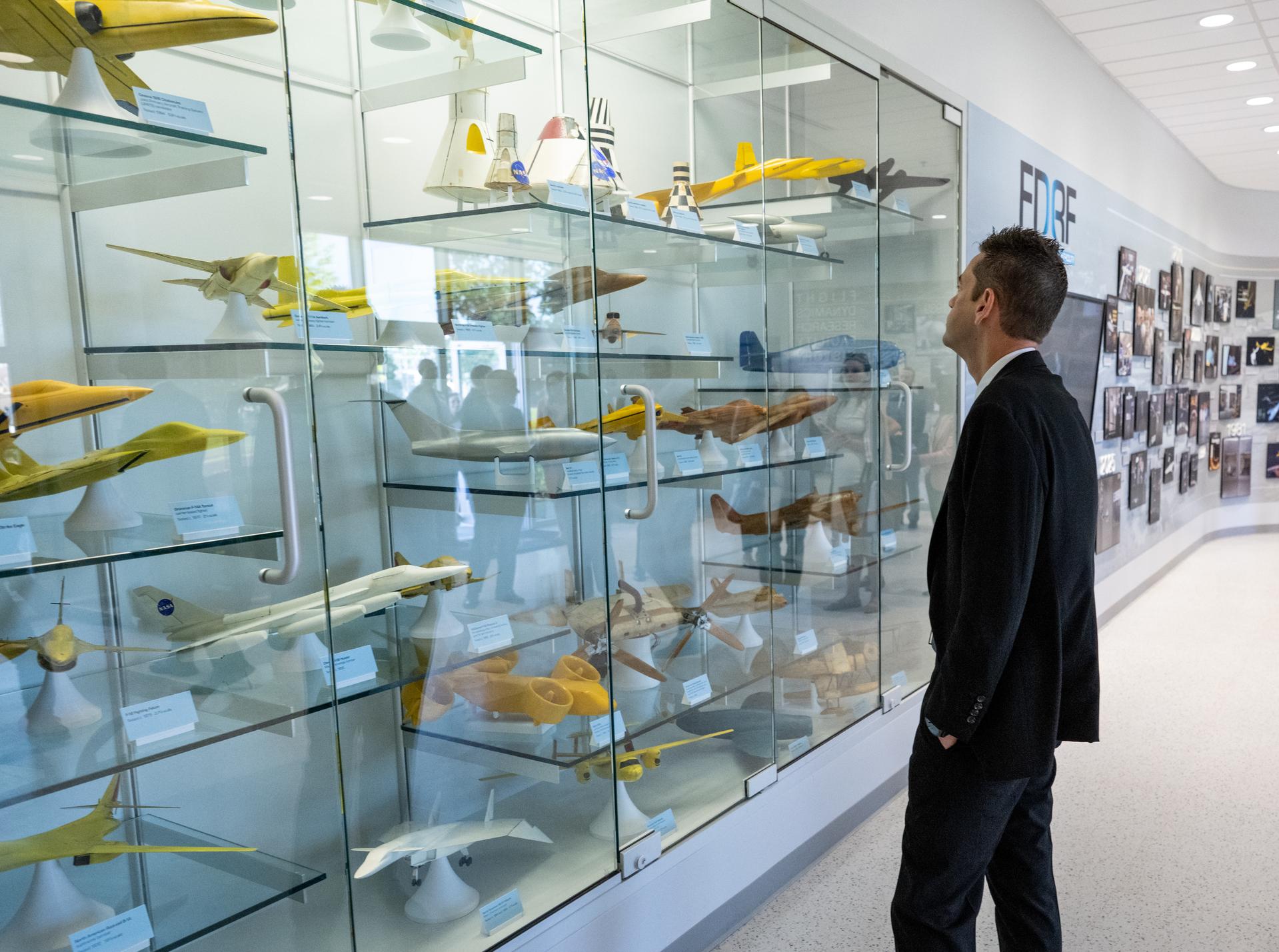 NASA Administrator Jared Isaacman views scale models of aircraft during a tour of the Flight Dynamics Research Facility, NASA's newest wind tunnel, Friday, July 31, 2026, at NASA’s Langley Research Center in Hampton, Virginia. The state-of-the-art facility will support research and technology development that will advance the agency’s aeronautics, exploration, and science goals, including establishing a sustained human presence on the lunar surface through the Artemis program and the development of a Moon Base. Photo Credit: (NASA/Keegan Barber)