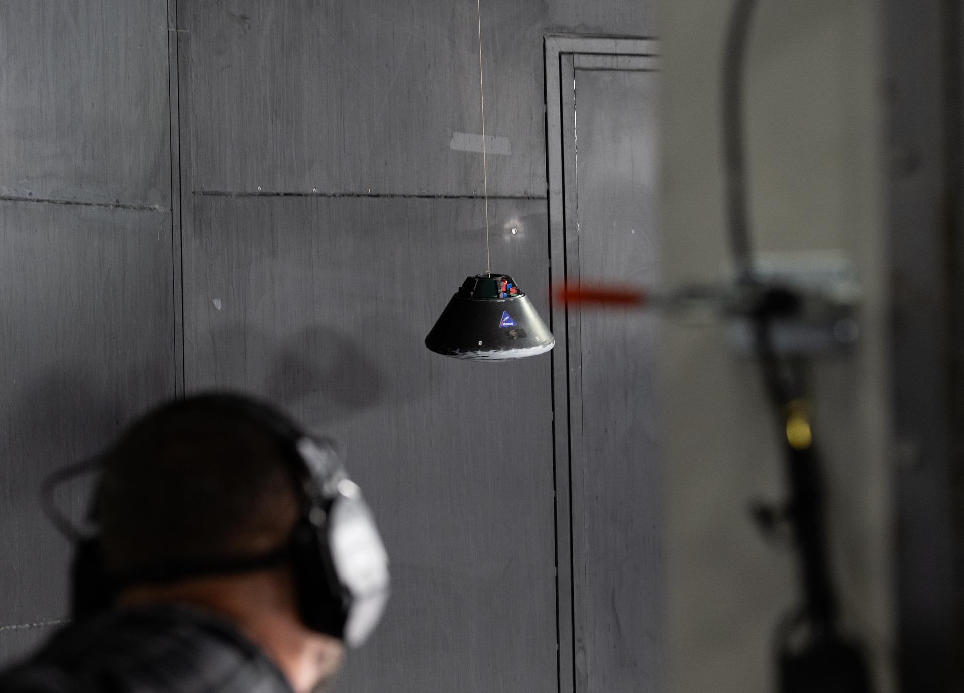 A scale model of the Orion capsule is seen during a demonstration at the Flight Dynamics Research Facility, NASA's newest wind tunnel, Friday, July 31, 2026, at NASA’s Langley Research Center in Hampton, Virginia. The state-of-the-art facility will support research and technology development that will advance the agency’s aeronautics, exploration, and science goals, including establishing a sustained human presence on the lunar surface through the Artemis program and the development of a Moon Base. Photo Credit: (NASA/Keegan Barber)