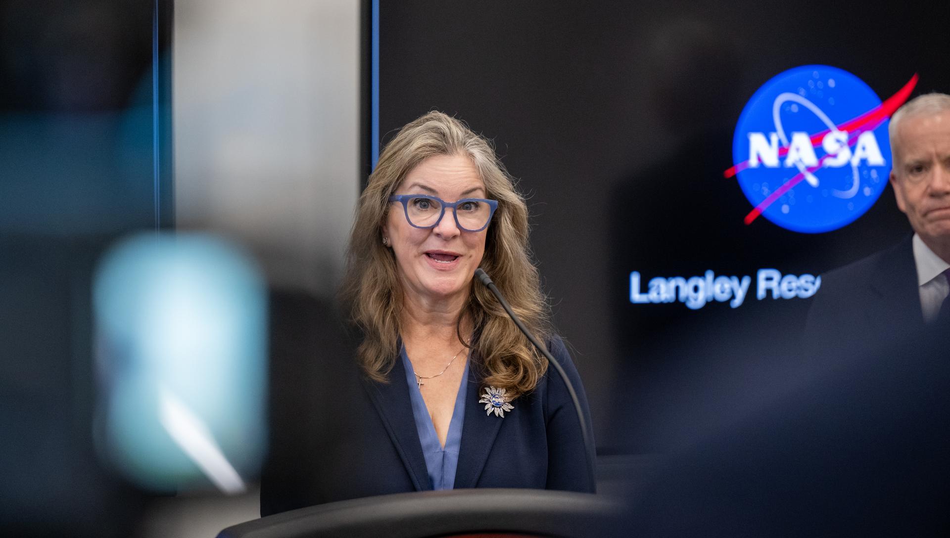 Dr. Trina Dyal, director of NASA's Langley Research Center, speaks with members of the media alongside Edward C. Forst, Administrator of the General Services Administration, right, at the Flight Dynamics Research Facility, NASA's newest wind tunnel, Friday, July 31, 2026, at NASA’s Langley Research Center in Hampton, Virginia. The state-of-the-art facility will support research and technology development that will advance the agency’s aeronautics, exploration, and science goals, including establishing a sustained human presence on the lunar surface through the Artemis program and the development of a Moon Base. Photo Credit: (NASA/Keegan Barber)
