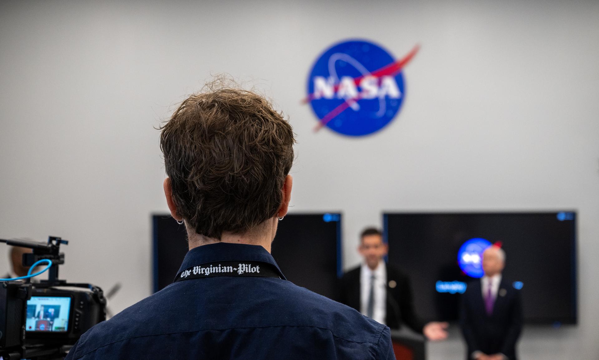 A reporter from The Virginian-Pilot is seen during a media engagement session with NASA Administrator Jared Isaacman, Dr. Trina Dyal, director of NASA's Langley Research Center, and Edward C. Forst, Administrator of the General Services Administration at the Flight Dynamics Research Facility, NASA's newest wind tunnel, Friday, July 31, 2026, at NASA’s Langley Research Center in Hampton, Virginia. The state-of-the-art facility will support research and technology development that will advance the agency’s aeronautics, exploration, and science goals, including establishing a sustained human presence on the lunar surface through the Artemis program and the development of a Moon Base. Photo Credit: (NASA/Keegan Barber)