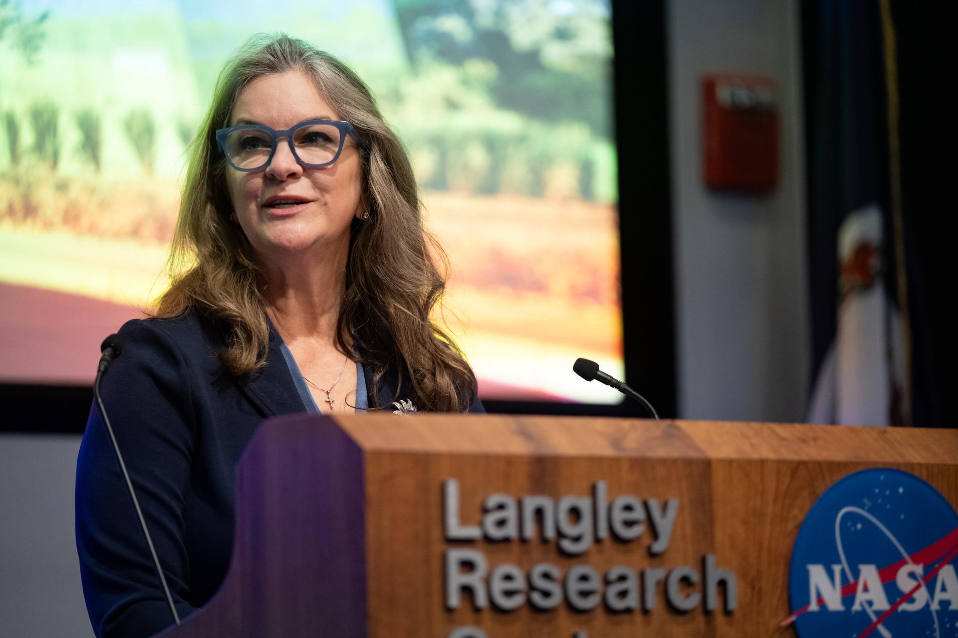 Dr. Trina Dyal, director of NASA's Langley Research Center, delivers remarks during a ribbon cutting ceremony for the Flight Dynamics Research Facility, NASA's newest wind tunnel, Friday, July 31, 2026, at NASA’s Langley Research Center in Hampton, Virginia. The state-of-the-art facility will support research and technology development that will advance the agency’s aeronautics, exploration, and science goals, including establishing a sustained human presence on the lunar surface through the Artemis program and the development of a Moon Base. Photo Credit: (NASA/Keegan Barber)
