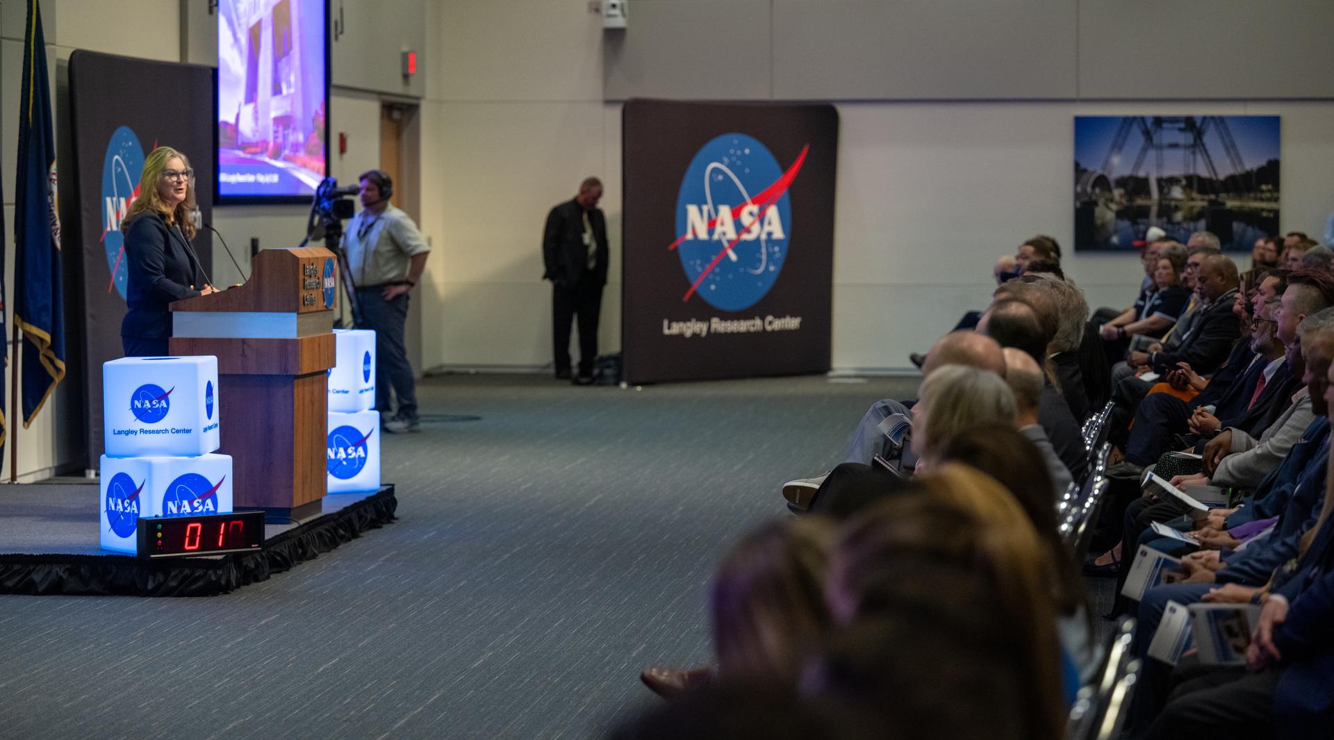 Dr. Trina Dyal, director of NASA's Langley Research Center, delivers remarks during a ribbon cutting ceremony for the Flight Dynamics Research Facility, NASA's newest wind tunnel, Friday, July 31, 2026, at NASA’s Langley Research Center in Hampton, Virginia. The state-of-the-art facility will support research and technology development that will advance the agency’s aeronautics, exploration, and science goals, including establishing a sustained human presence on the lunar surface through the Artemis program and the development of a Moon Base. Photo Credit: (NASA/Keegan Barber)