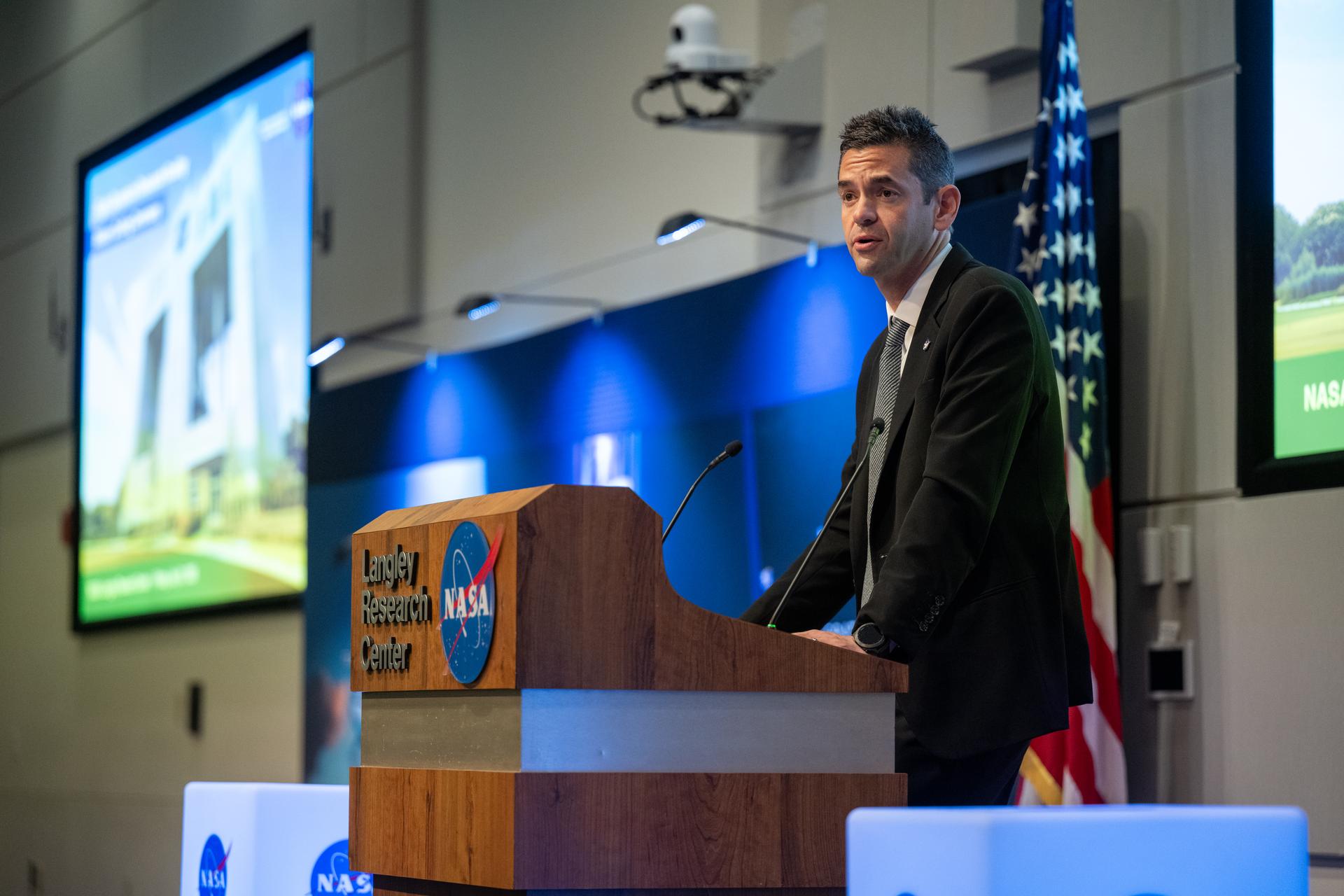 NASA Administrator Jared Isaacman delivers remarks during a ribbon cutting ceremony for the Flight Dynamics Research Facility, NASA's newest wind tunnel,  Friday, July 31, 2026, at NASA’s Langley Research Center in Hampton, Virginia. The state-of-the-art facility will support research and technology development that will advance the agency’s aeronautics, exploration, and science goals, including establishing a sustained human presence on the lunar surface through the Artemis program and the development of a Moon Base. Photo Credit: (NASA/Keegan Barber)