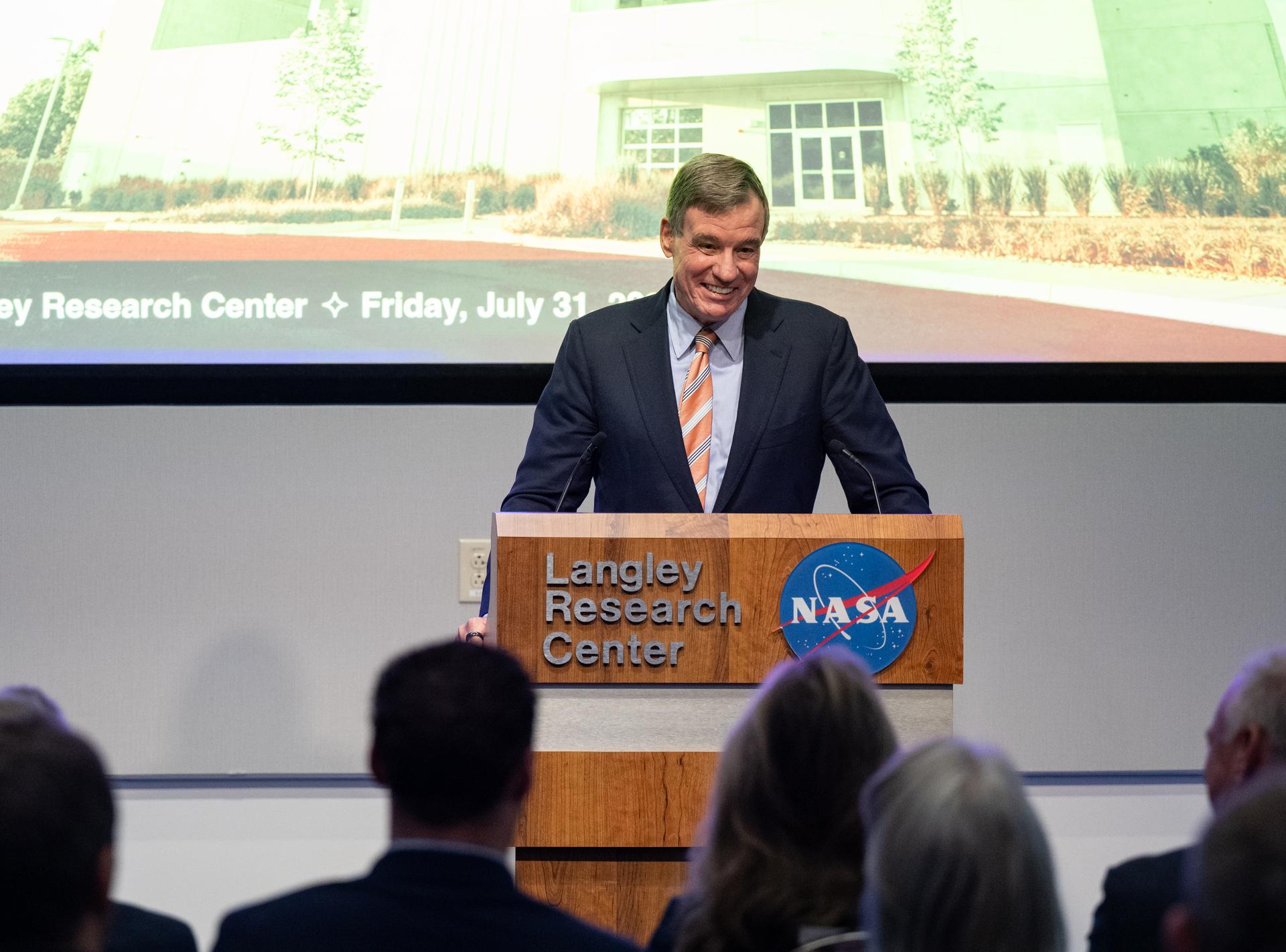 Senator Mark Warner (D-Va.) delivers remarks during a ribbon cutting ceremony for the Flight Dynamics Research Facility, NASA's newest wind tunnel, Friday, July 31, 2026, at NASA’s Langley Research Center in Hampton, Virginia. The state-of-the-art facility will support research and technology development that will advance the agency’s aeronautics, exploration, and science goals, including establishing a sustained human presence on the lunar surface through the Artemis program and the development of a Moon Base. Photo Credit: (NASA/Keegan Barber)