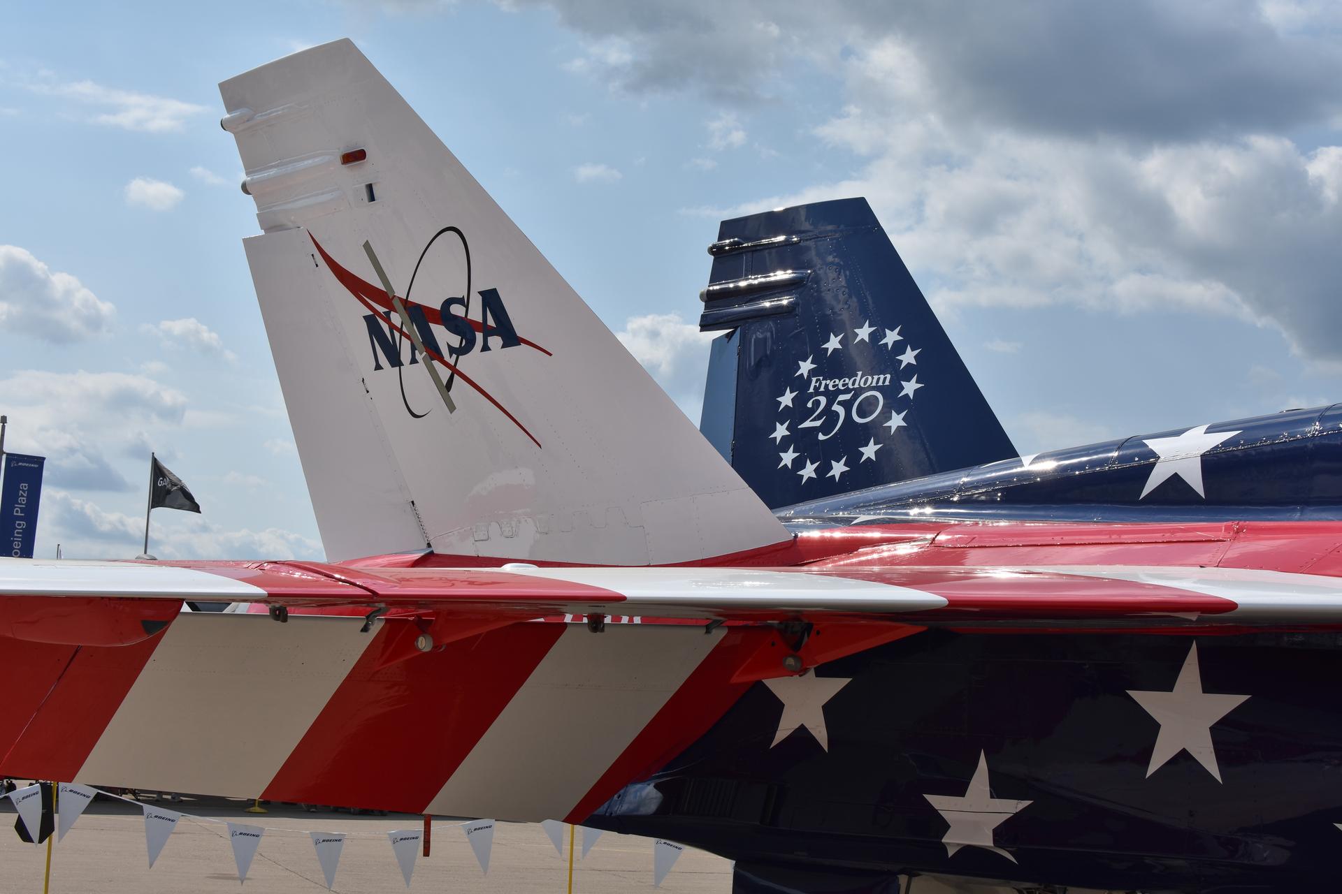 NASA’s F/A-18 aircraft painted with new red, white, and blue livery to celebrate America’s 250th birthday is shown on display at Boeing Plaza at the 2026 Experimental Aircraft Association (EAA) AirVenture air show in Oshkosh, Wisconsin, on Friday, July 24, 2026.