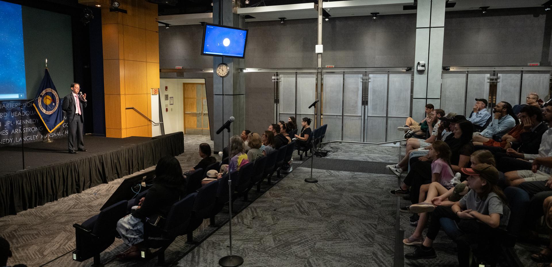 Dr. Dominic Benford, program scientist for the nancy grace roman space telescope, speaks at a Frontiers Forum event titled "Countdown to Launch – Why We’re Excited about the Nancy Grace Roman Space Telescope," Thursday, Aug. 6, 2026, at the Mary W. Jackson NASA Headquarters building in Washington.  Photo Credit: (NASA/Keegan Barber)
