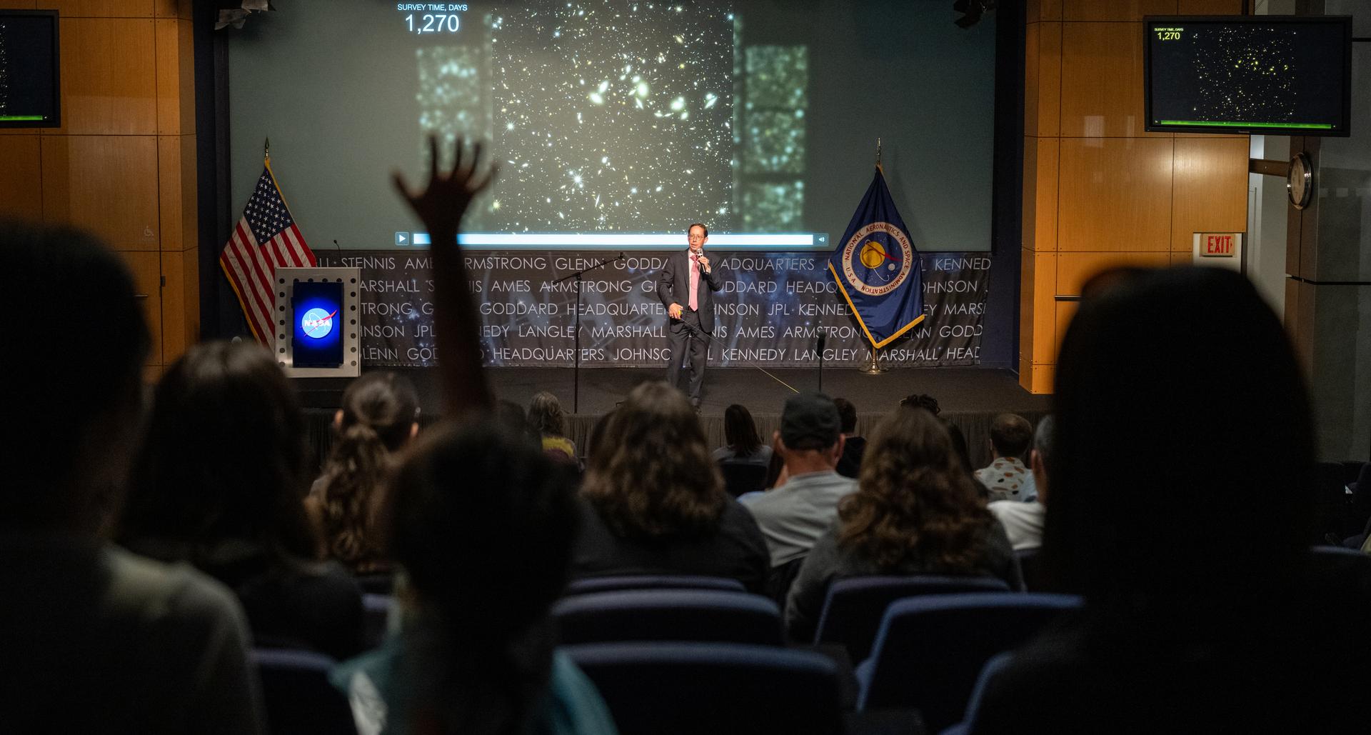 Dr. Dominic Benford, program scientist for the nancy grace roman space telescope, speaks at a Frontiers Forum event titled "Countdown to Launch – Why We’re Excited about the Nancy Grace Roman Space Telescope," Thursday, Aug. 6, 2026, at the Mary W. Jackson NASA Headquarters building in Washington.  Photo Credit: (NASA/Keegan Barber)
