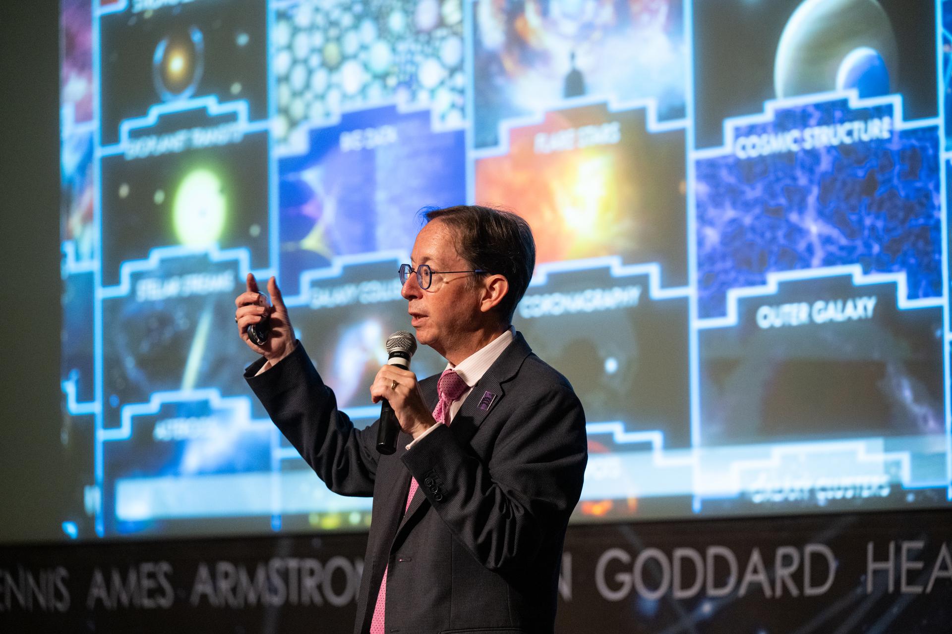 Dr. Dominic Benford, program scientist for the nancy grace roman space telescope, speaks at a Frontiers Forum event titled "Countdown to Launch – Why We’re Excited about the Nancy Grace Roman Space Telescope," Thursday, Aug. 6, 2026, at the Mary W. Jackson NASA Headquarters building in Washington.  Photo Credit: (NASA/Keegan Barber)