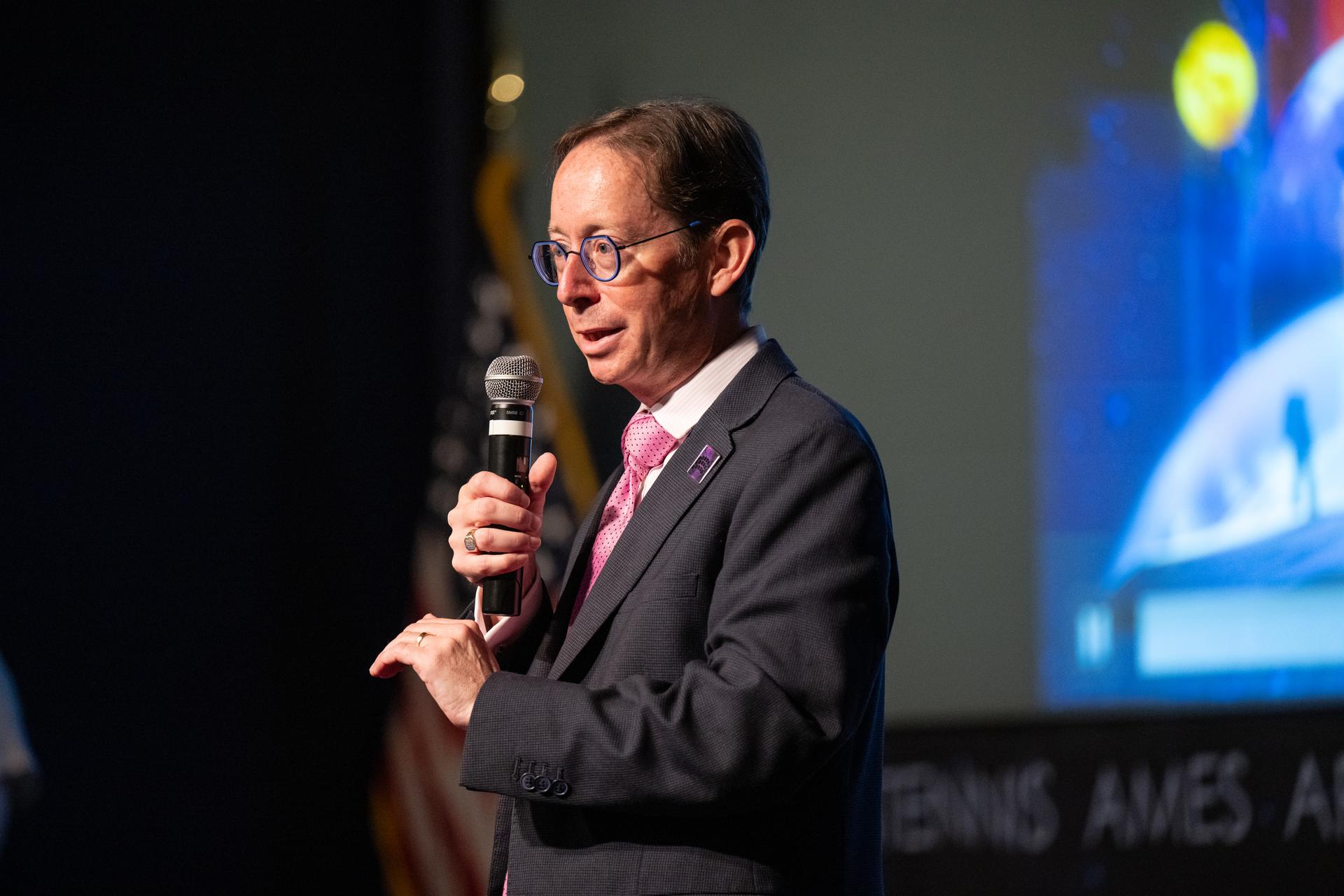 Dr. Dominic Benford, program scientist for the nancy grace roman space telescope, answers questions from visitors during a Frontiers Forum event titled "Countdown to Launch – Why We’re Excited about the Nancy Grace Roman Space Telescope," Thursday, Aug. 6, 2026, at the Mary W. Jackson NASA Headquarters building in Washington.  Photo Credit: (NASA/Keegan Barber)