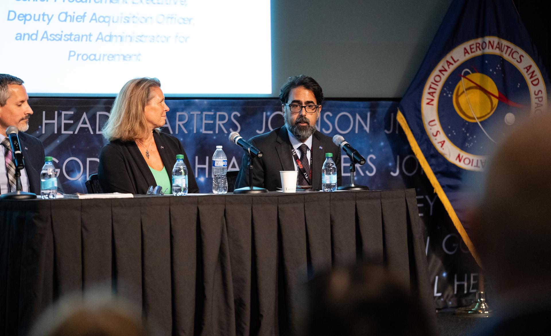 NASA Associate Administrator Amit Kshatriya, right, delivers remarks alongside Lori Glaze, associate administrator for NASA’s Human Spaceflight Mission Directorate, and Bradley Niese, assistant administrator for procurement, during a White House Leadership Development Program event Friday, Aug. 21, 2026, at the Mary W. Jackson NASA Headquarters building in Washington.  Photo Credit: (NASA/Keegan Barber)