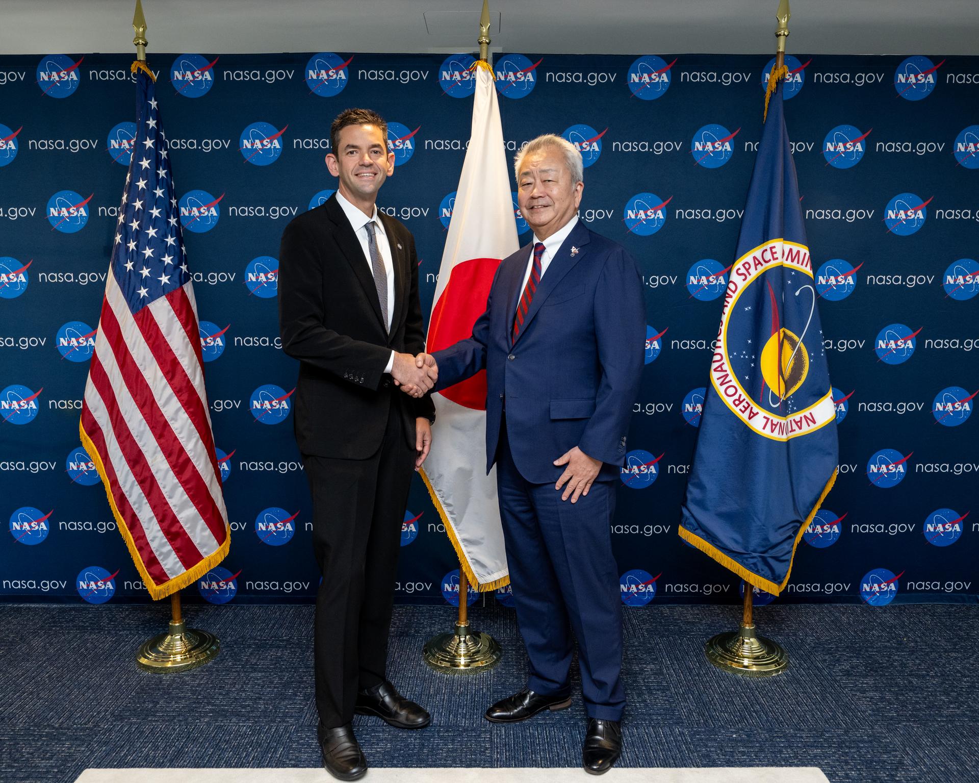 NASA Administrator Jared Isaacman, left, and Jun Sawada, Chairman of Japan’s National Space Policy Committee (NSPC), right, pose for a photo Monday, Aug. 24, 2026, at the Mary W. Jackson NASA Headquarters building in Washington. Photo Credit: (NASA/Keegan Barber)