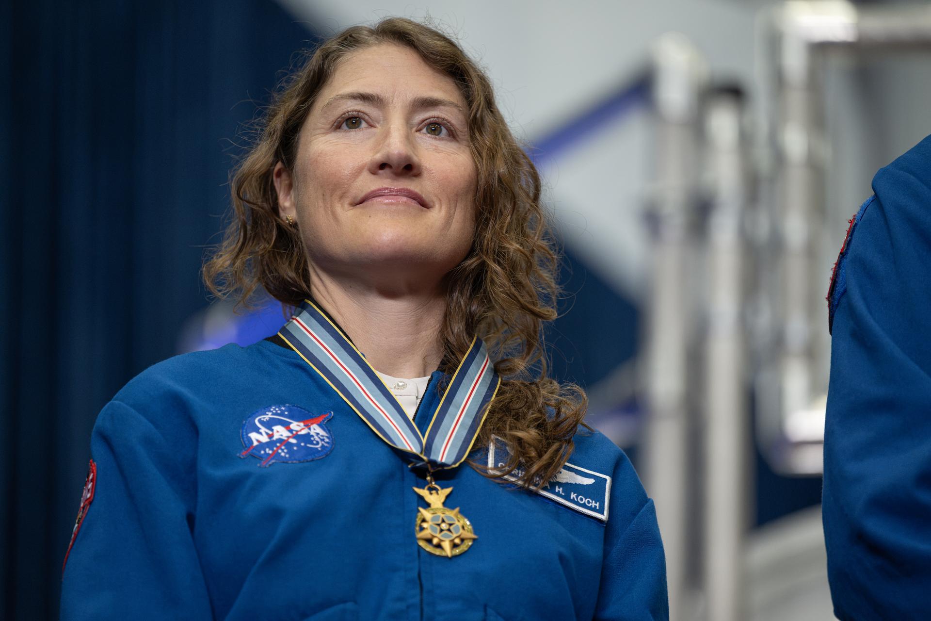 NASA astronaut Artemis II mission specialist Christina Koch is seen during an event to award the Congressional Space Medal of Honor to the Artemis II crew, Friday, Aug. 28, 2026, at NASA's Johnson Space Center in Houston, Texas. The Artemis II crew completed their approximately ten-day mission around the Moon in April 2026 and are the 31st, 32nd, 33rd, and 34th astronauts to receive the award. Photo Credit: (NASA/John Kraus)