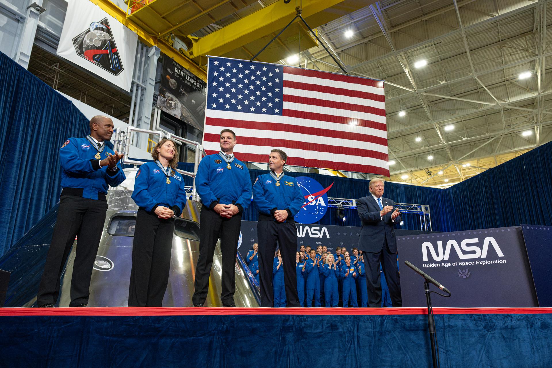 The Artemis II crew of NASA astronauts pilot Victor Glover and mission specialist Christina Koch, Canadian Space Agency astronaut mission specialist Jeremy Hansen, NASA astronaut commander Reid Wiseman, and President Donald Trump are seen during an event to award the Congressional Space Medal of Honor to the Artemis II crew, Friday, Aug. 28, 2026, at NASA's Johnson Space Center in Houston, Texas. The Artemis II crew completed their approximately ten-day mission around the Moon in April 2026 and are the 31st, 32nd, 33rd, and 34th astronauts to receive the award. Photo Credit: (NASA/John Kraus)