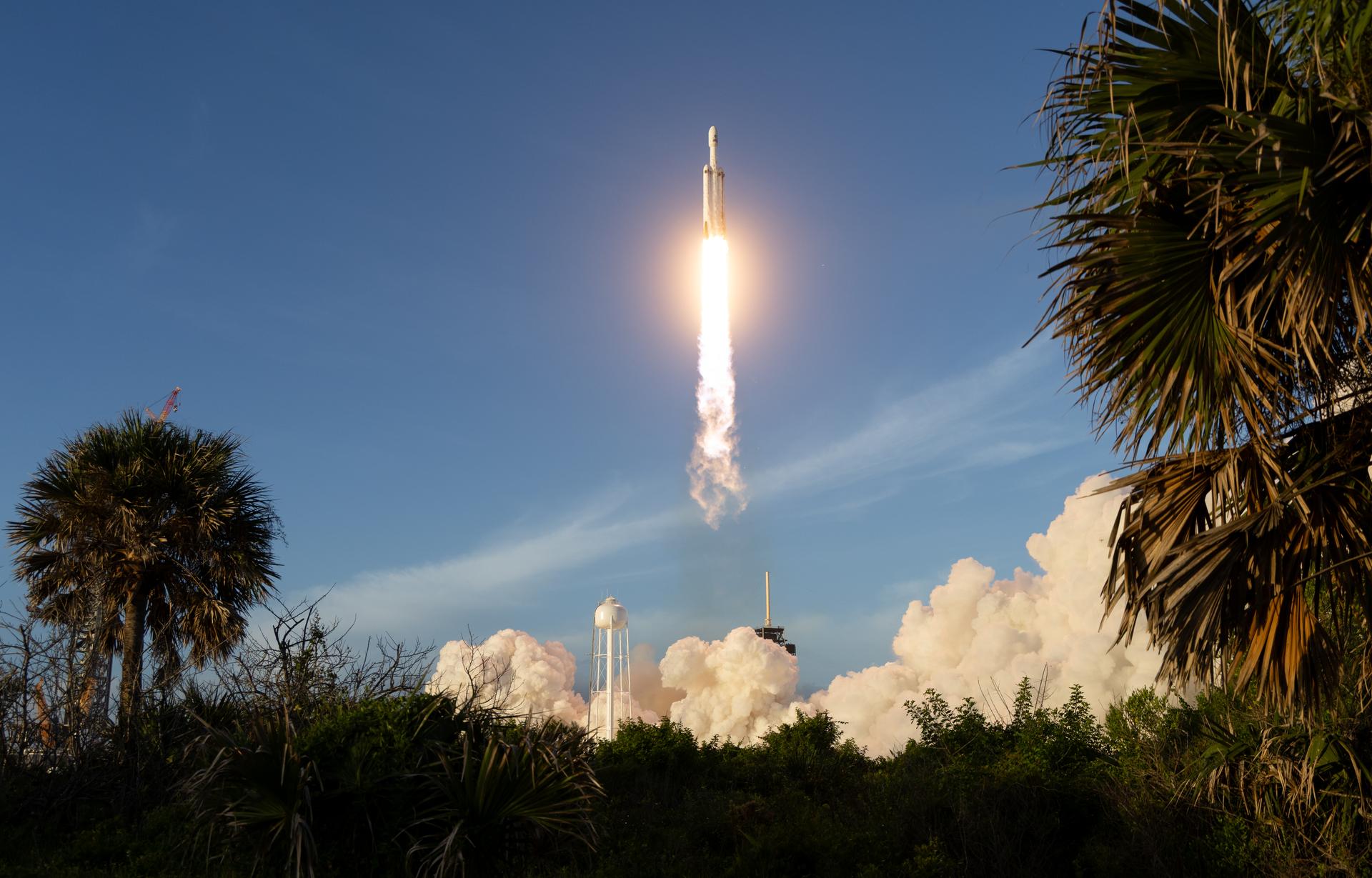 A SpaceX Falcon Heavy rocket launches with NASA’S Nancy Grace Roman Space Telescope onboard from Launch Complex 39A, Sunday, Aug. 30, 2026, at NASA’s Kennedy Space Center in Florida. Roman will investigate dark energy and dark matter, conduct a statistical census of planetary systems, and enable a broad range of additional astrophysics research. Launch occurred at 7:26 a.m. EDT. Photo Credit (NASA/Joel Kowsky)