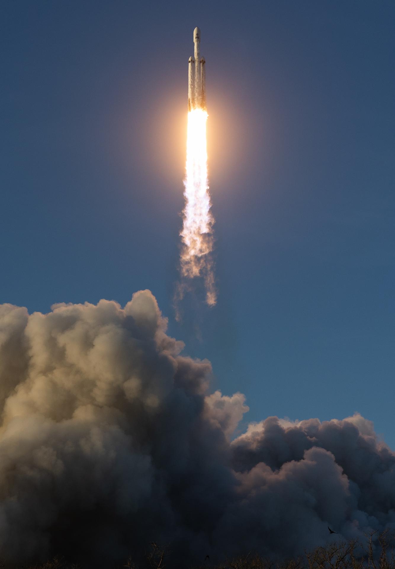 A SpaceX Falcon Heavy rocket launches with NASA’S Nancy Grace Roman Space Telescope onboard from Launch Complex 39A, Sunday, Aug. 30, 2026, at NASA’s Kennedy Space Center in Florida. Roman will investigate dark energy and dark matter, conduct a statistical census of planetary systems, and enable a broad range of additional astrophysics research. Launch occurred at 7:26 a.m. EDT. Photo Credit (NASA/Joel Kowsky)