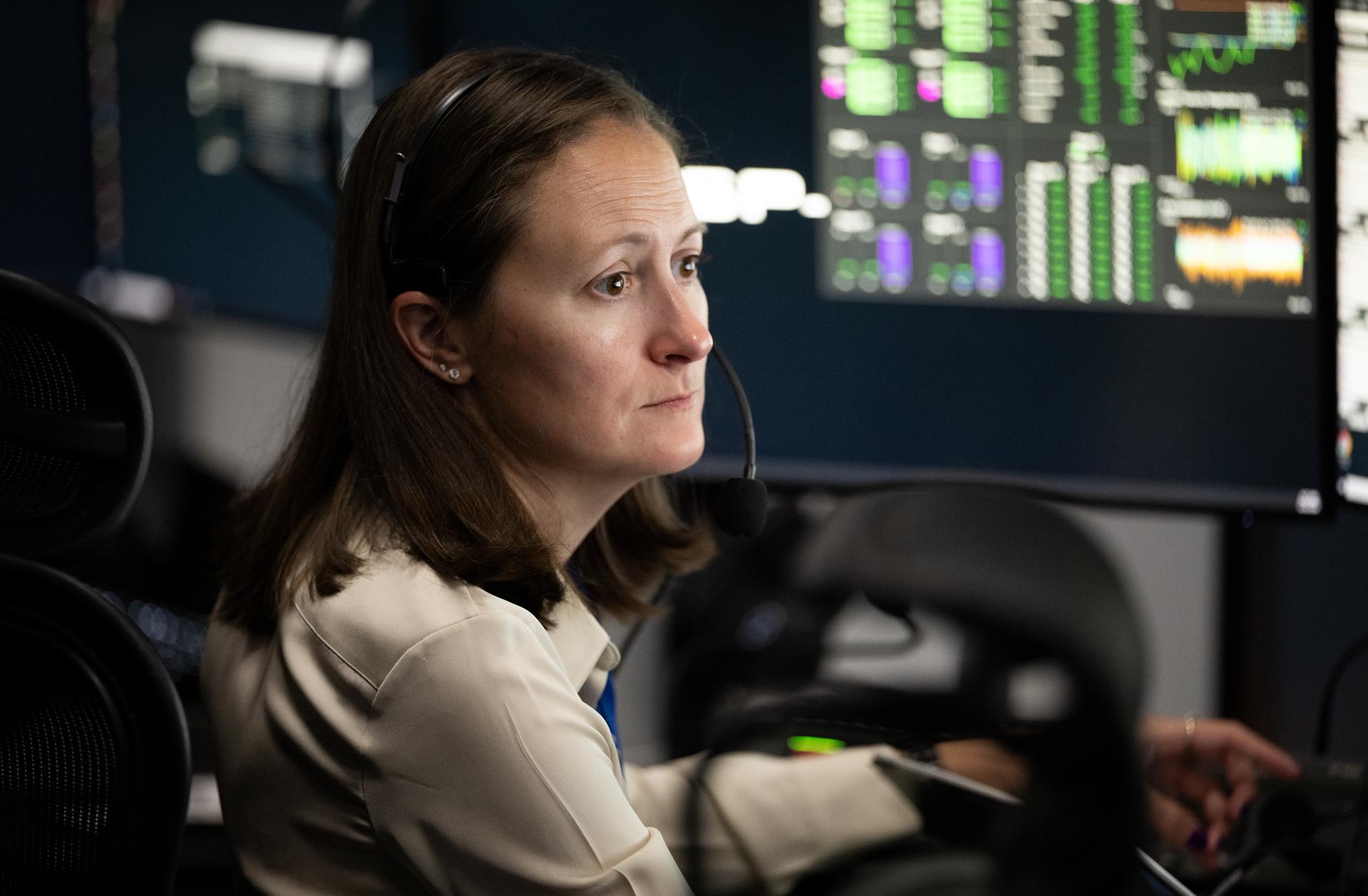 Genevieve Futch, mission manager for NASA’s Launch Services Program, monitors the countdown inside SpaceX’s Hangar X for the launch of a SpaceX Falcon Heavy rocket with NASA’S Nancy Grace Roman Space Telescope from Launch Complex 39A at NASA’s Kennedy Space Center, Sunday, Aug. 30, 2026, in Florida. Roman will investigate dark energy and dark matter, conduct a statistical census of planetary systems, and enable a broad range of additional astrophysics research. Launch occurred at 7:26 a.m. EDT. Photo Credit (NASA/Joel Kowsky)