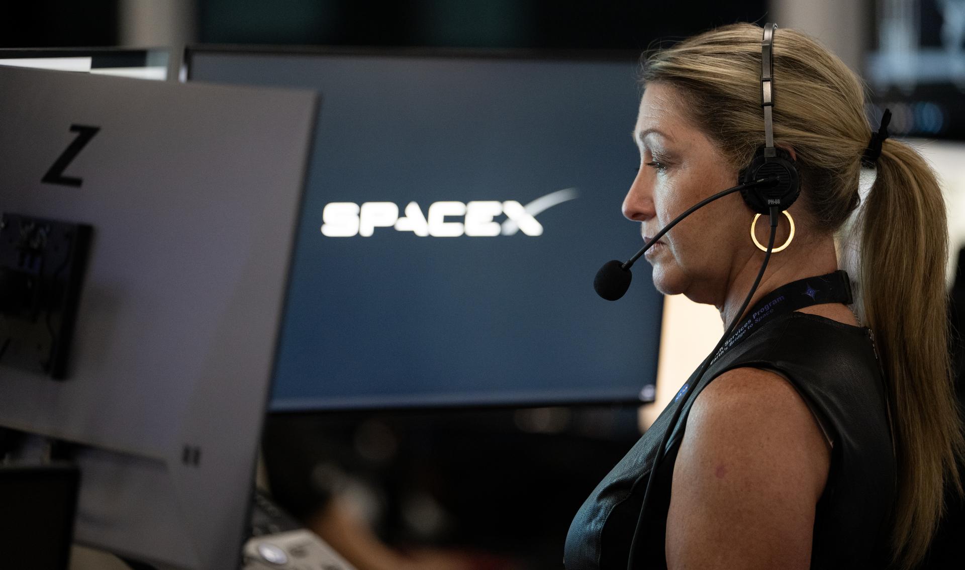 Penni Baez, launch operations manager for NASA’s Launch Services Program, monitors the countdown inside SpaceX’s Hangar X for the launch of a SpaceX Falcon Heavy rocket with NASA’S Nancy Grace Roman Space Telescope from Launch Complex 39A at NASA’s Kennedy Space Center, Sunday, Aug. 30, 2026, in Florida. Roman will investigate dark energy and dark matter, conduct a statistical census of planetary systems, and enable a broad range of additional astrophysics research. Launch occurred at 7:26 a.m. EDT. Photo Credit (NASA/Joel Kowsky)
