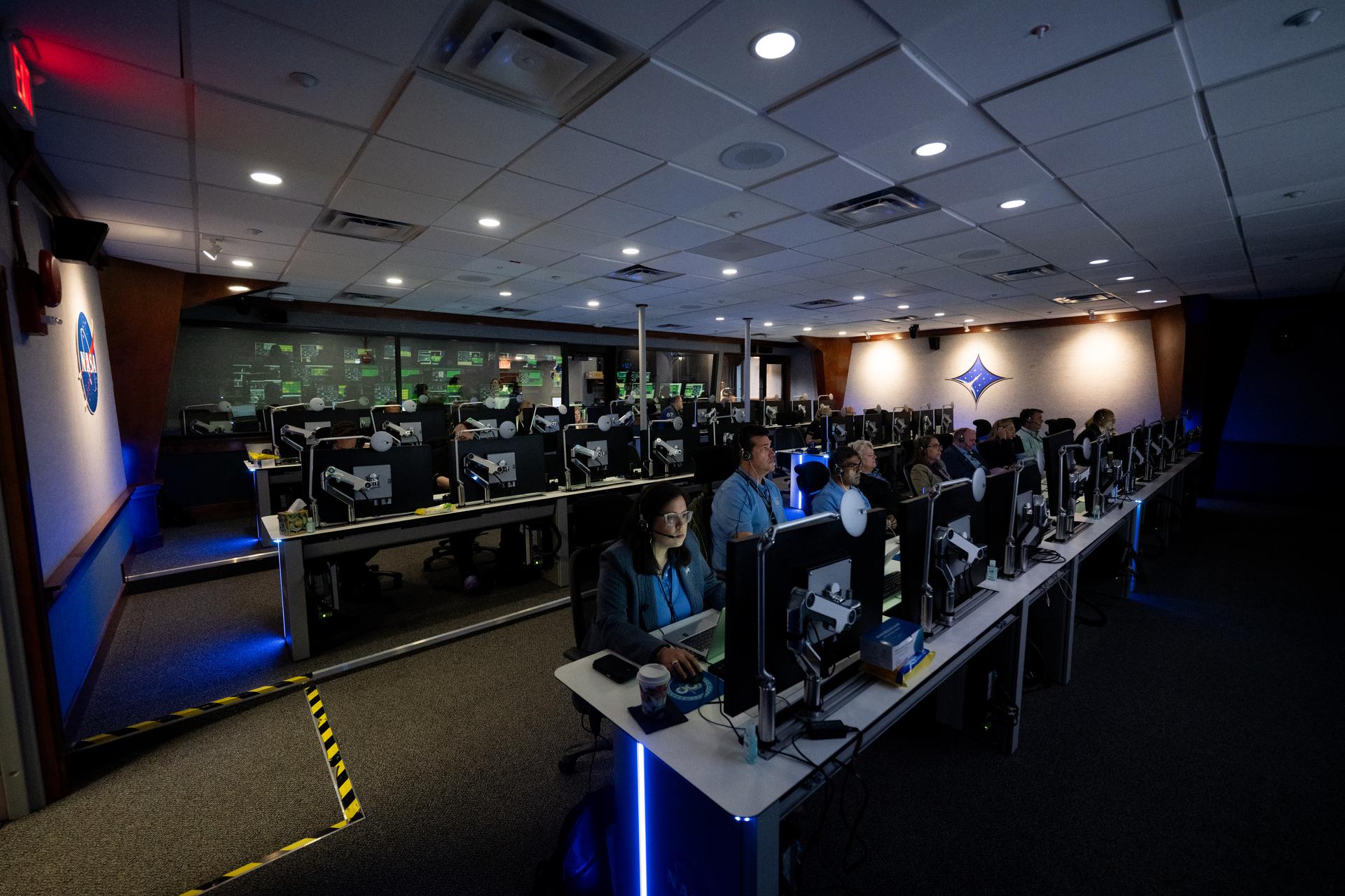 The Mission Directors Center inside Hangar AE at Cape Canaveral Space Force Station is seen as teams monitor the countdown for the launch of a SpaceX Falcon Heavy rocket with NASA’S Nancy Grace Roman Space Telescope from Launch Complex 39A at NASA’s Kennedy Space Center, Sunday, Aug. 30, 2026, in Florida. Roman will investigate dark energy and dark matter, conduct a statistical census of planetary systems, and enable a broad range of additional astrophysics research. Launch occurred at 7:26 a.m. EDT. Photo Credit (NASA/Joel Kowsky)