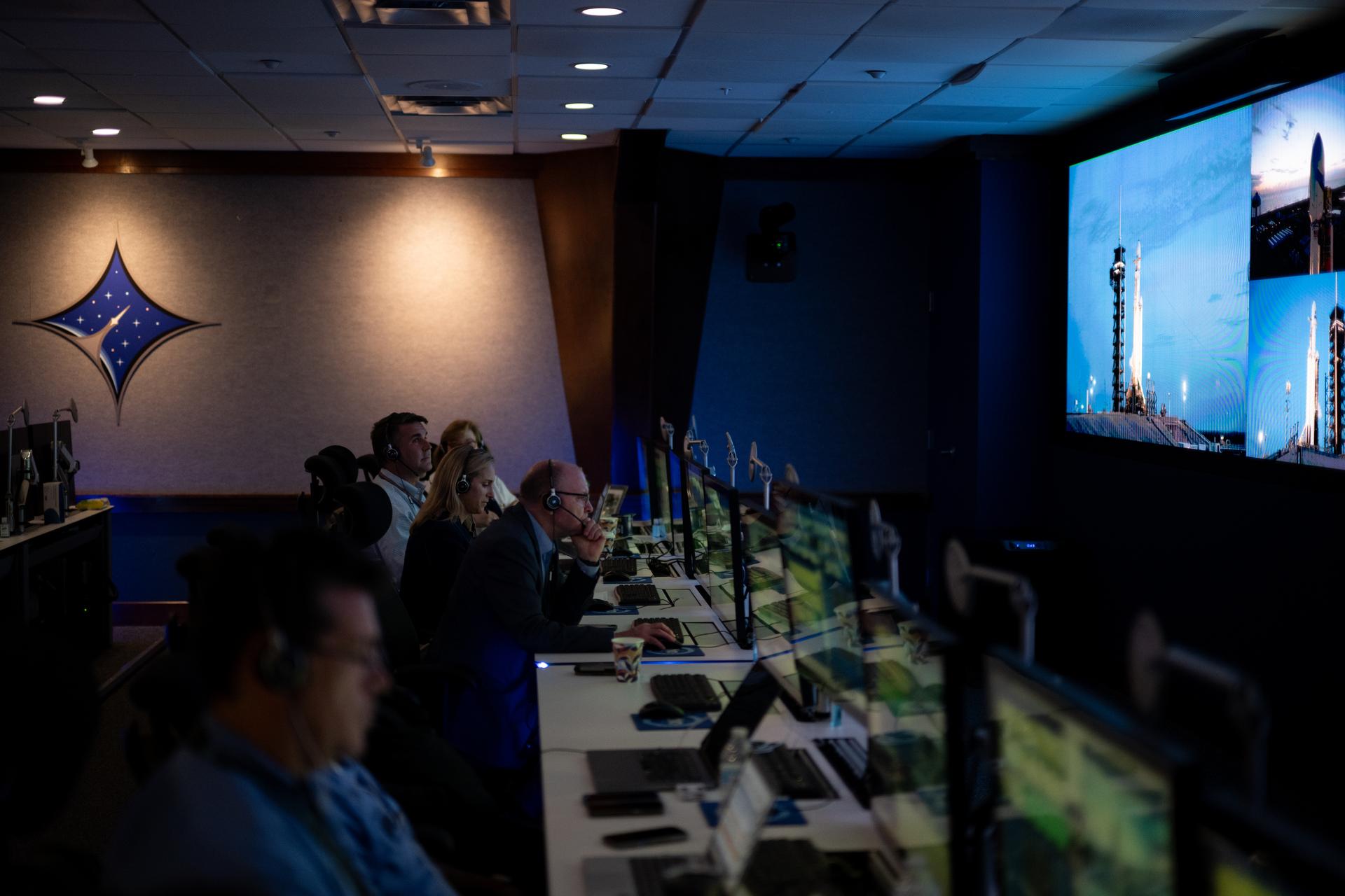 The Mission Directors Center inside Hangar AE at Cape Canaveral Space Force Station is seen as teams monitor the countdown for the launch of a SpaceX Falcon Heavy rocket with NASA’S Nancy Grace Roman Space Telescope from Launch Complex 39A at NASA’s Kennedy Space Center, Sunday, Aug. 30, 2026, in Florida. Roman will investigate dark energy and dark matter, conduct a statistical census of planetary systems, and enable a broad range of additional astrophysics research. Launch occurred at 7:26 a.m. EDT. Photo Credit (NASA/Joel Kowsky)