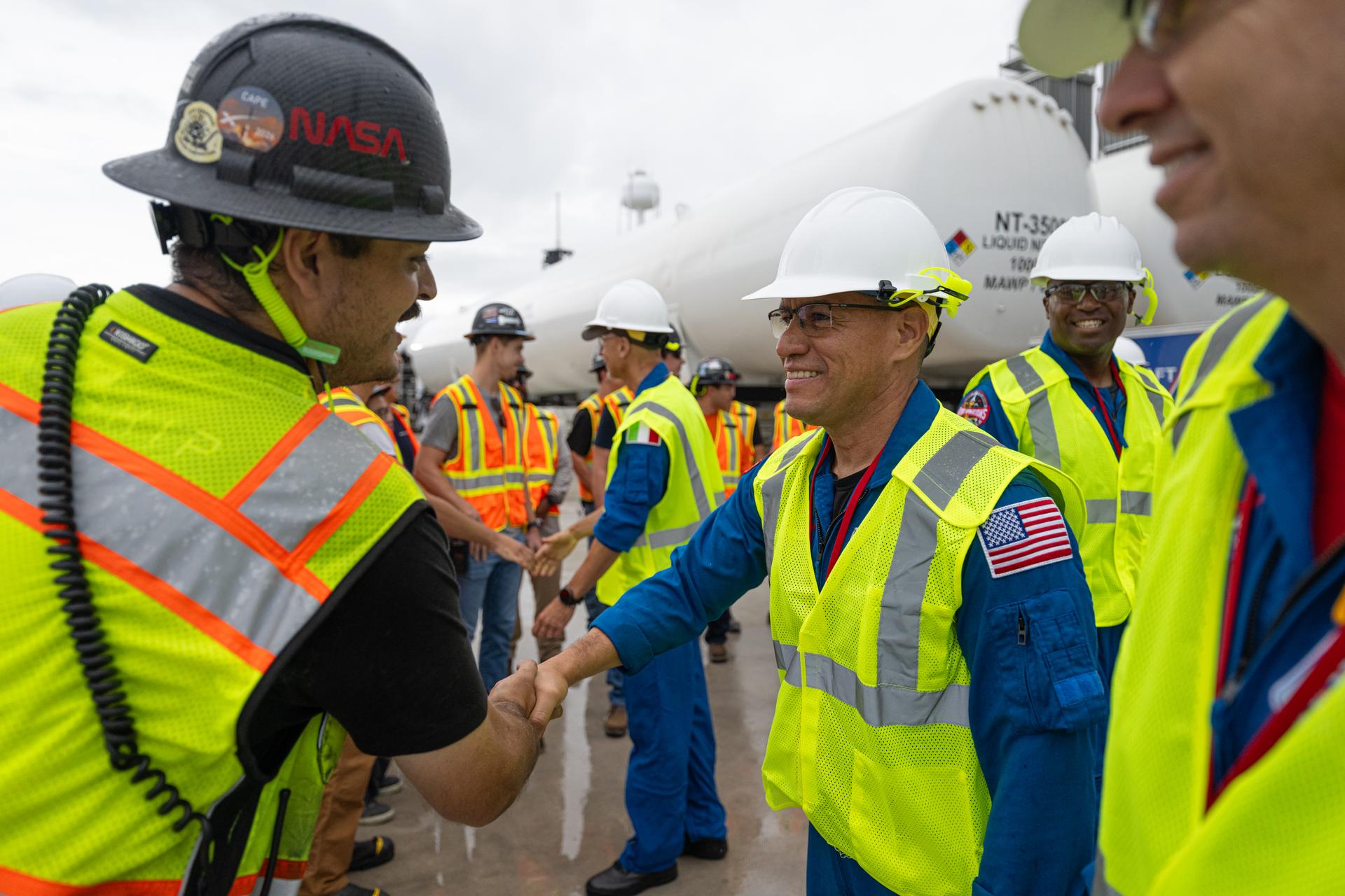 Artemis III crewmembers European Space Agency astronaut Luca Parmitano, pilot; and NASA astronauts Frank Rubio, mission specialist; Andre Douglas, mission specialist; and Randy Bresnik, commander, greet members of the SpaceX workforce at Launch Complex 39A, Thursday, Sept. 3, 2026, at NASA’s Kennedy Space Center in Florida. Photo Credit: (NASA/John Kraus)