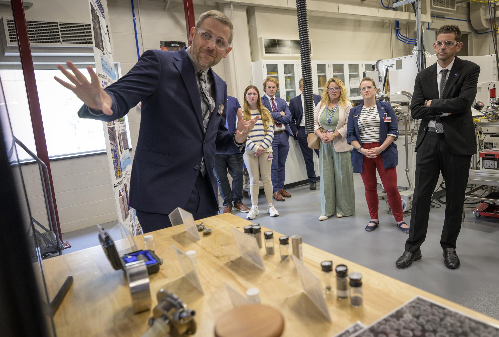 NASA Administrator Jared Isaacman, right, listens to Jordan Tiarks, Scientist, Ames National Laboratory, left, as he tours the lab, Tuesday, Sept. 8, 2026, on the campus of Iowa State University in Ames, Iowa. Photo Credit: (NASA/Bill Ingalls)