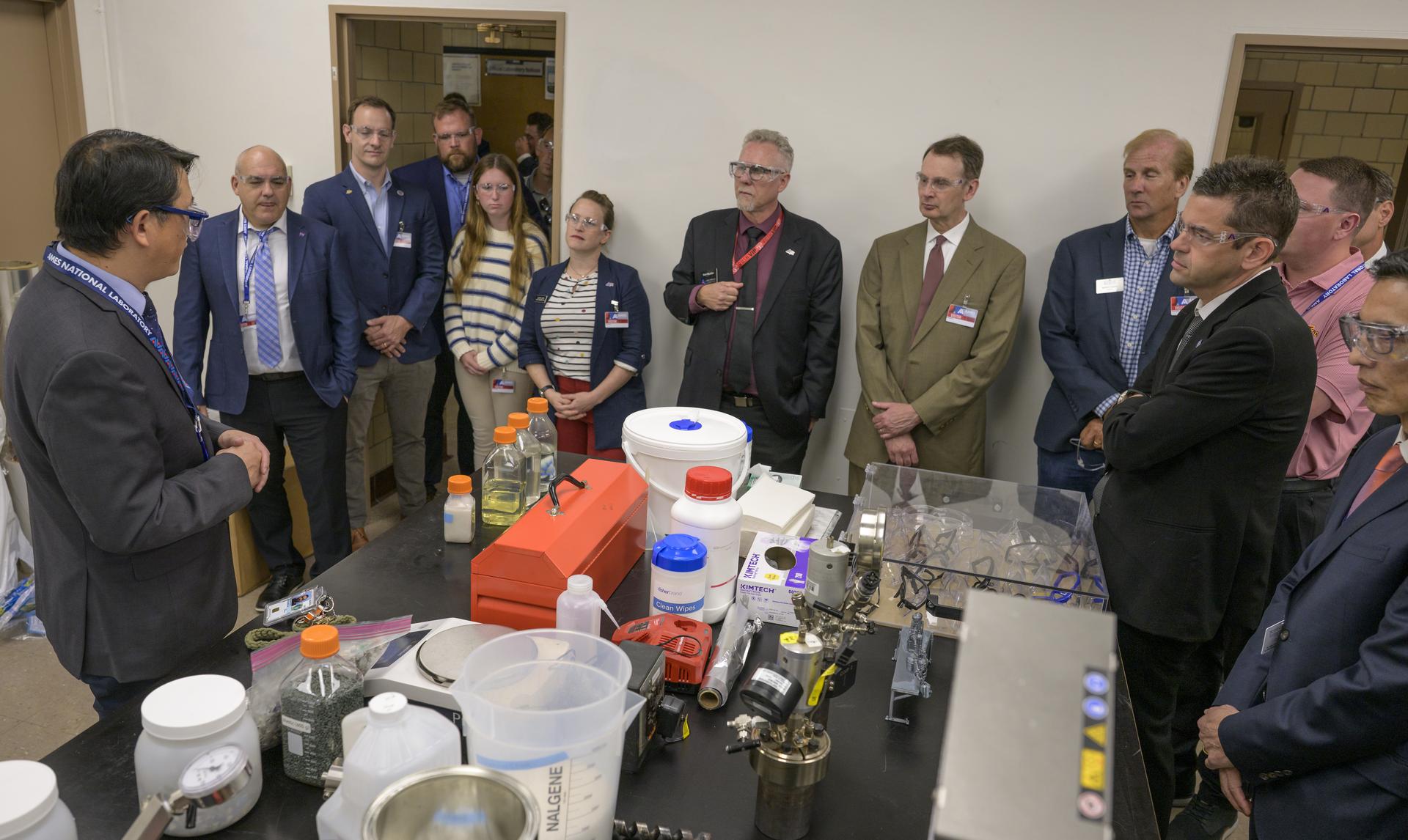 NASA Administrator Jared Isaacman, right, listens to Wenyu Huang, Scientist, Ames National Laboratory, left, as he tours the facility, Tuesday, Sept. 8, 2026, on the campus of Iowa State University in Ames, Iowa. Photo Credit: (NASA/Bill Ingalls)