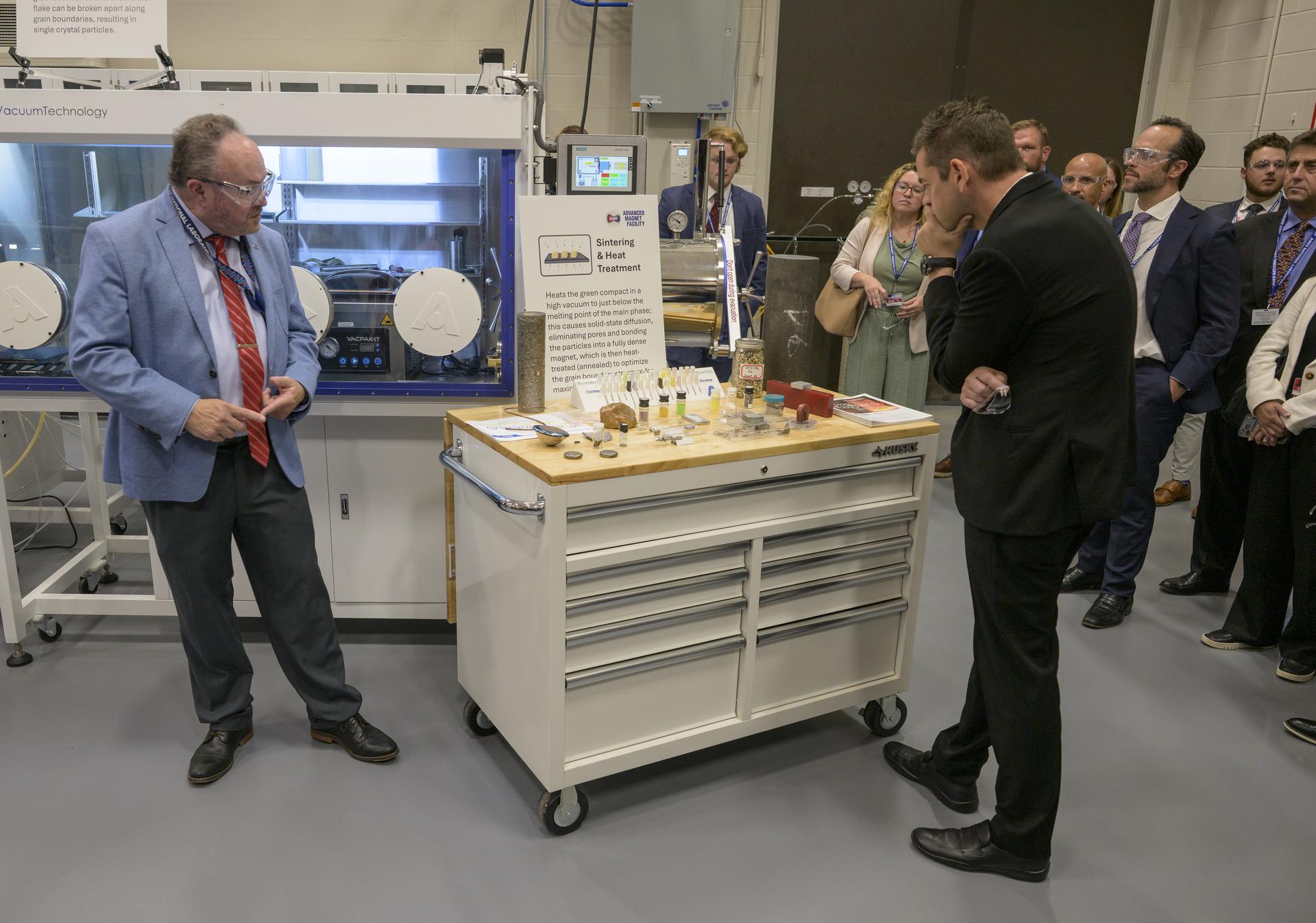 NASA Administrator Jared Isaacman, right, listens to James Morris, Chief Research Officer, Ames National Laboratory, left, as he tours the facility, Tuesday, Sept. 8, 2026, on the campus of Iowa State University in Ames, Iowa. Photo Credit: (NASA/Bill Ingalls)