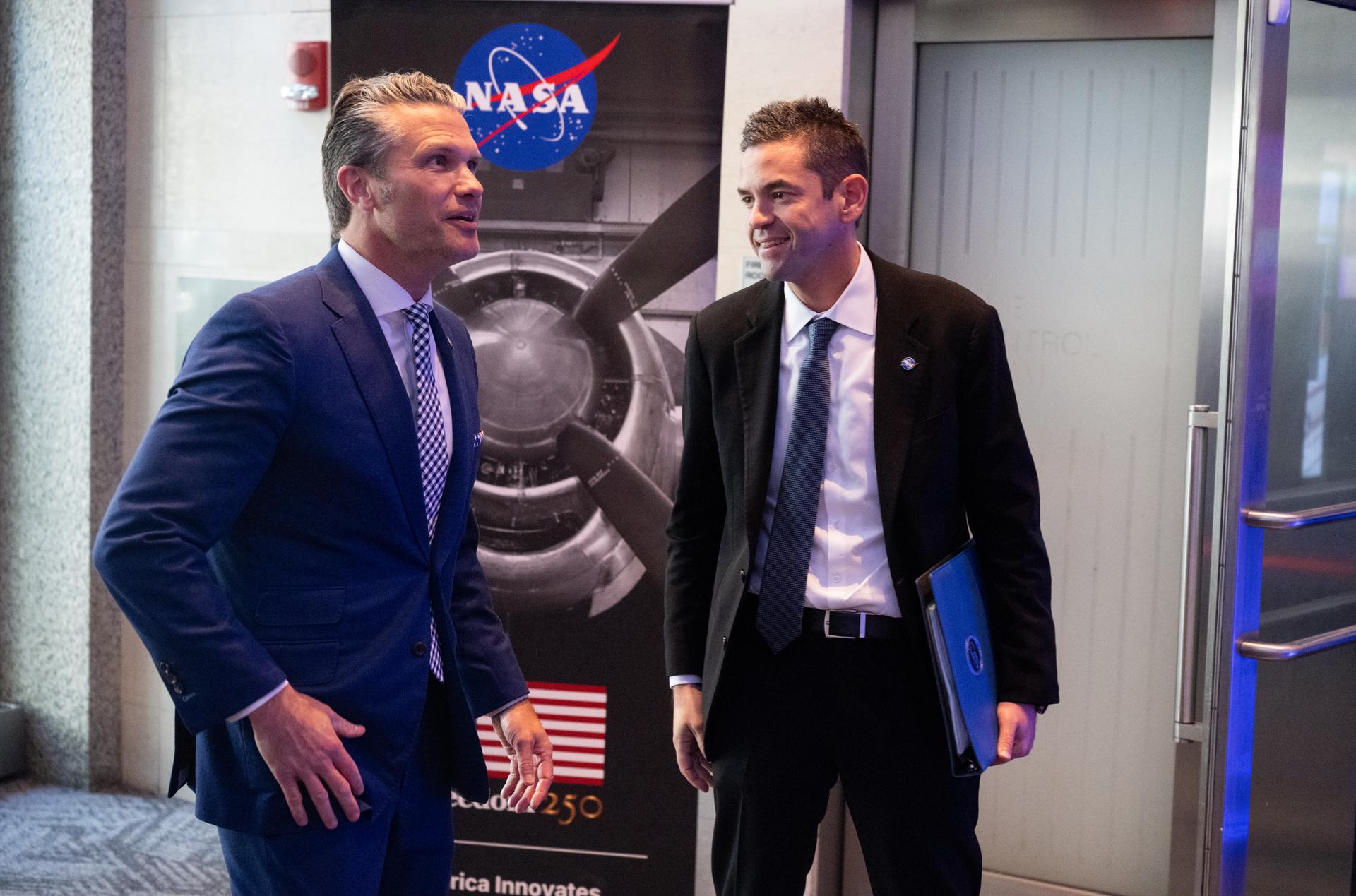 Secretary of War Pete Hegseth, left, is greeted by NASA Administrator Jared Isaacman as he arrives for a meeting of the Presidential Commission on the United States Space Academy at the Mary W. Jackson NASA Headquarters Building, Wednesday, Sept. 9, 2026, in Washington. The commission will meet and submit a report proposing recommendations for the establishment of the Space Academy. Photo Credit (NASA/Joel Kowsky)